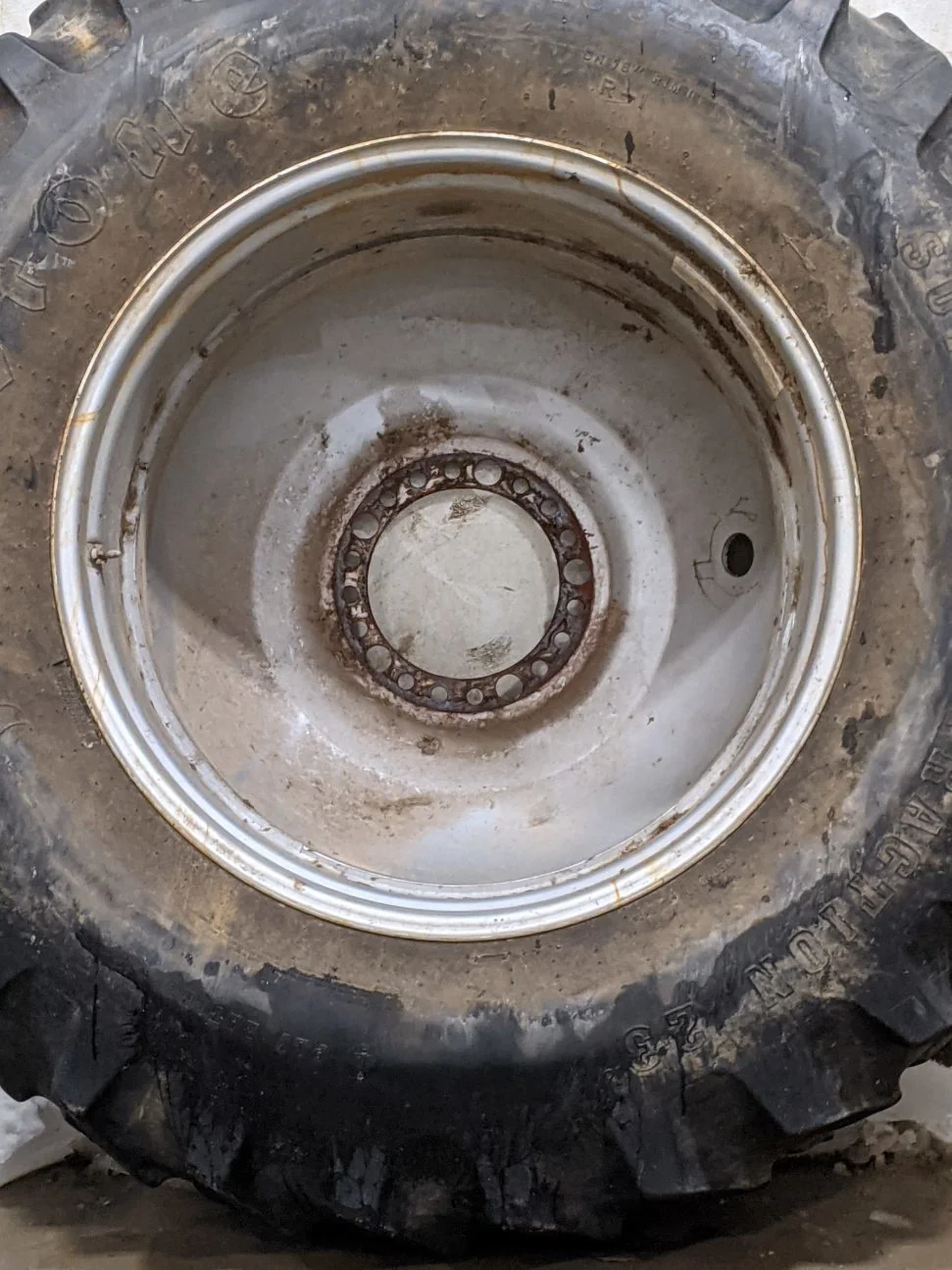 Used 45% 20.8-38 Firestone Radial Deep Tread 23 (155B) R-1W on a 18 x 38 Case Silver 20 Bolt Dolly D image 2
