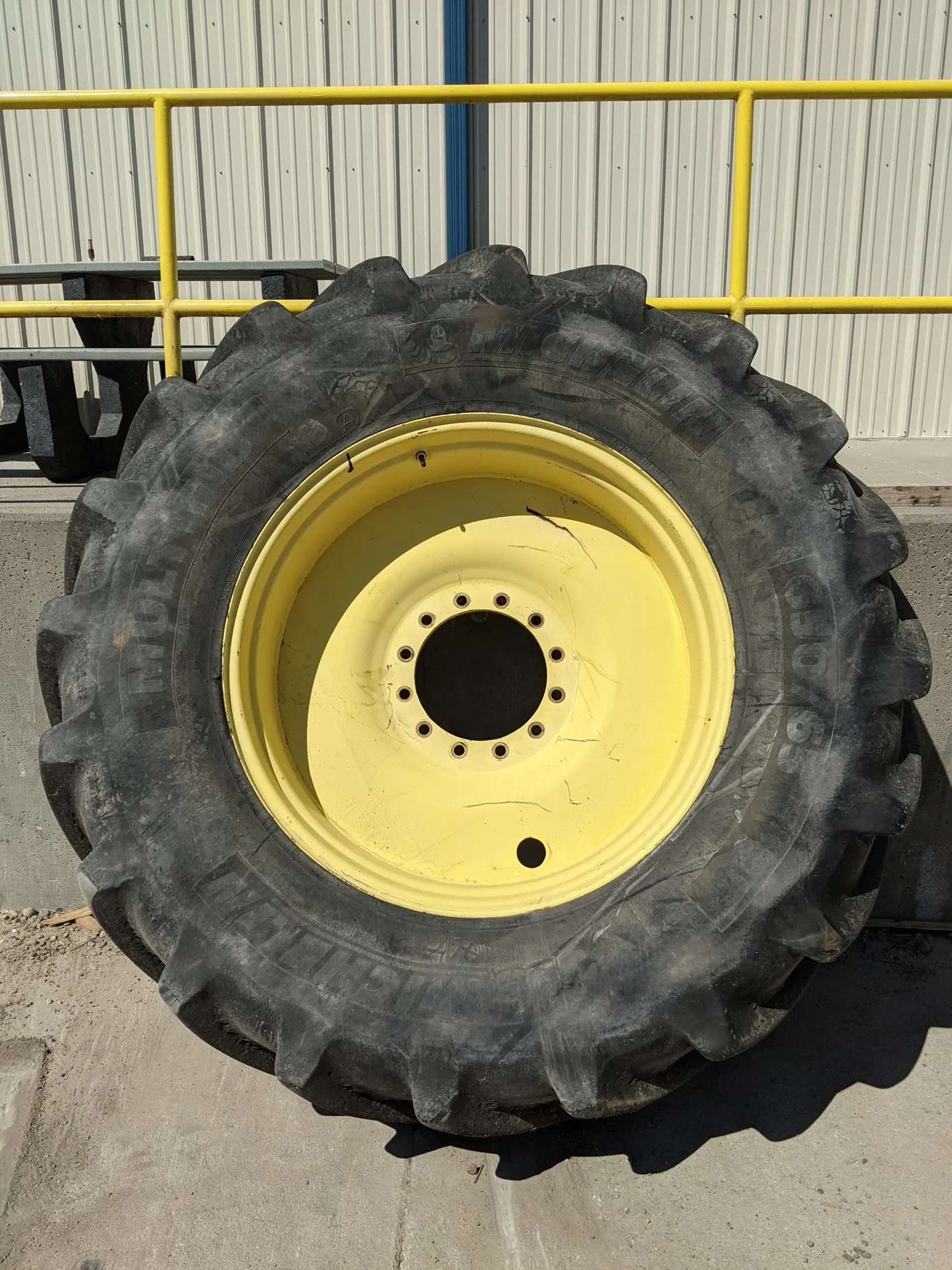 Used 85% 650/65R38 Michelin MultiBib R-1W (157D) TL on a 18 x 38 JD Yellow 12 Bolt (.905) Spray image 2