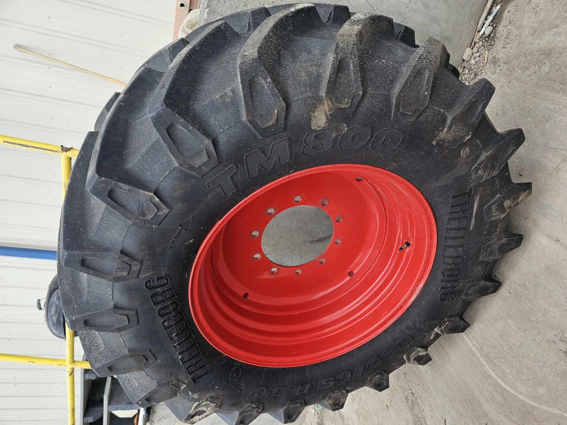 Used 90% 540/65R30 Trelleborg TM800 High Speed R-1W (150D) TL on a 16 x 30 Fendt Red 10 Bolt Formed