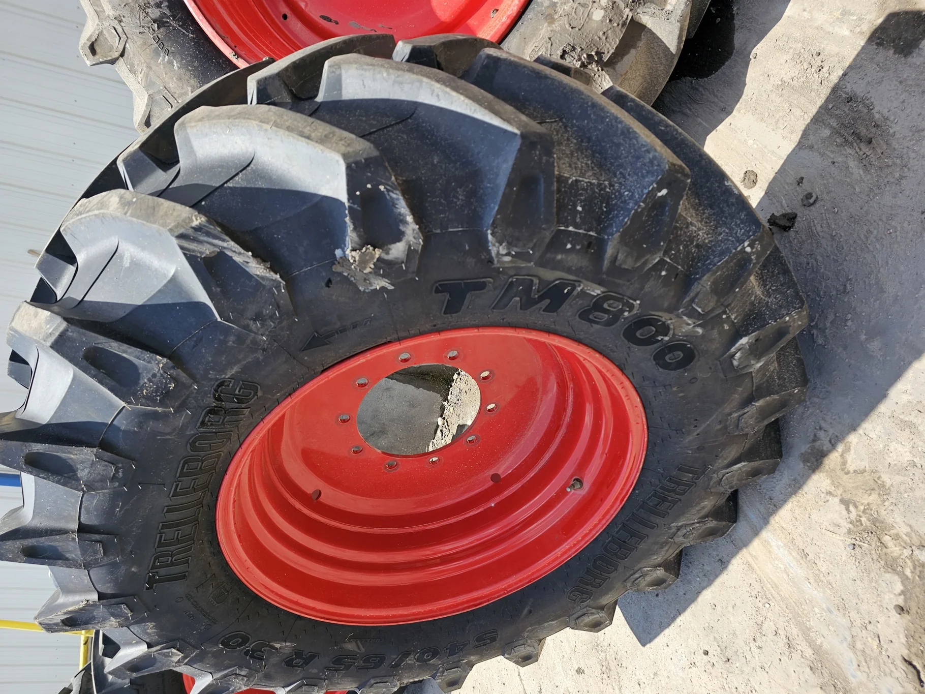 Used 90% 540/65R30 Trelleborg TM800 High Speed R-1W (150D) TL on a 16 x 30 Fendt Red  10 Bolt Formed