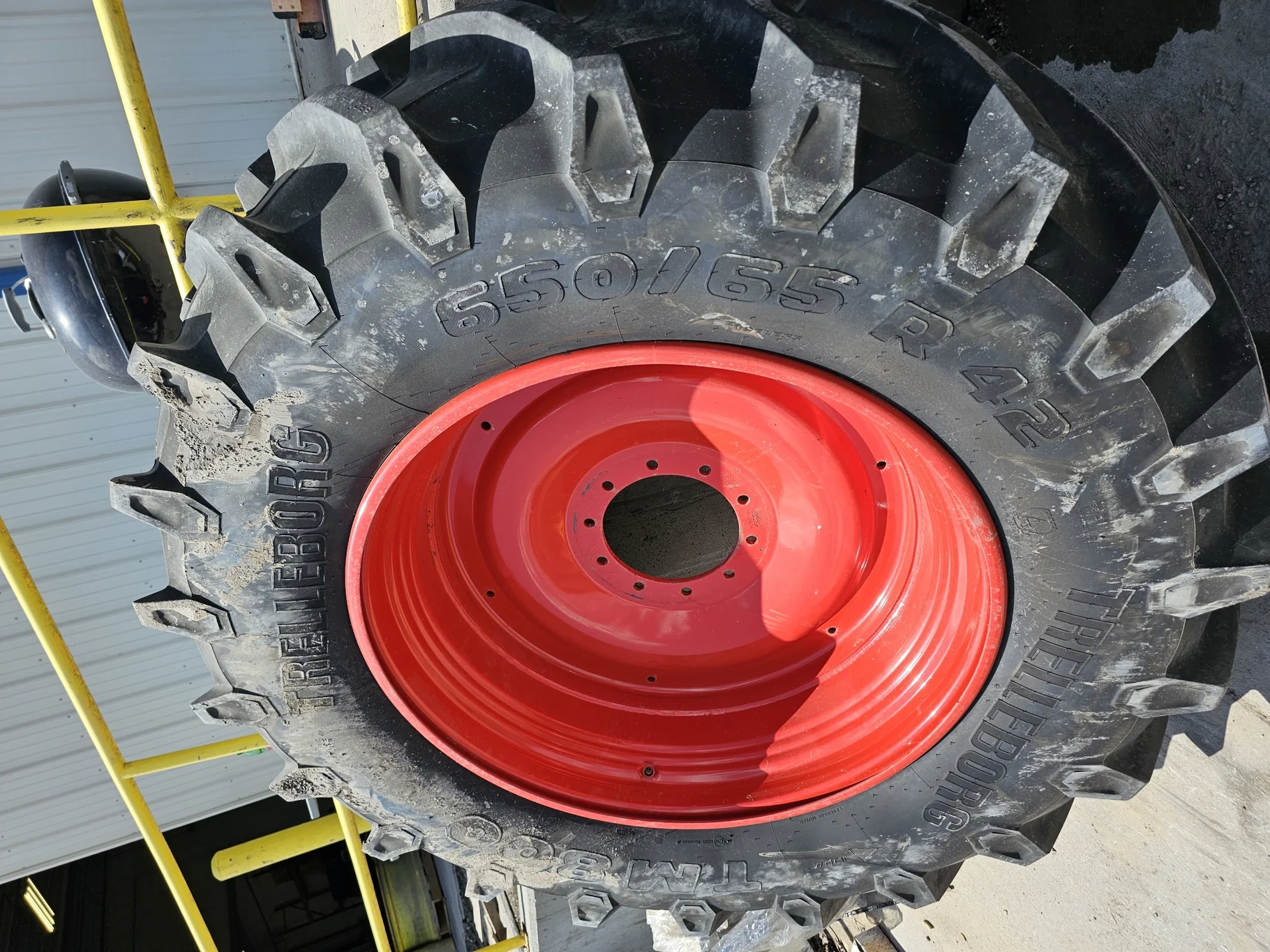 Used 90% 650/65R42 Trelleborg TM800 High Speed R-1W (158D) TL on a 20 x 42 Fendt Red 10 Bolt (.937)