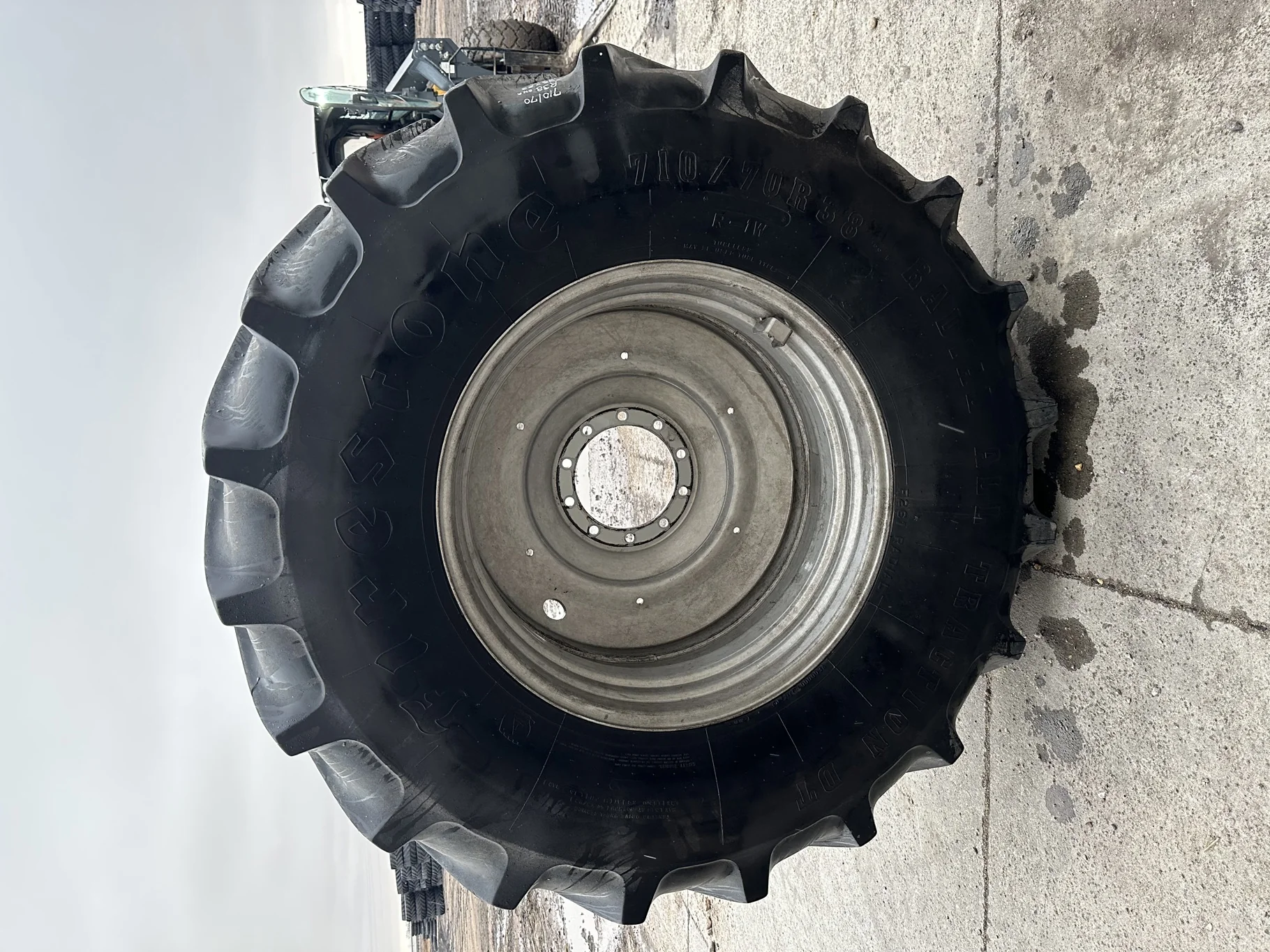 Used 75% 710/70R38 Firestone Radial All Traction DT R-1W (166B) TL on a 23 x 38 CIH Silver 10 Bolt image 2