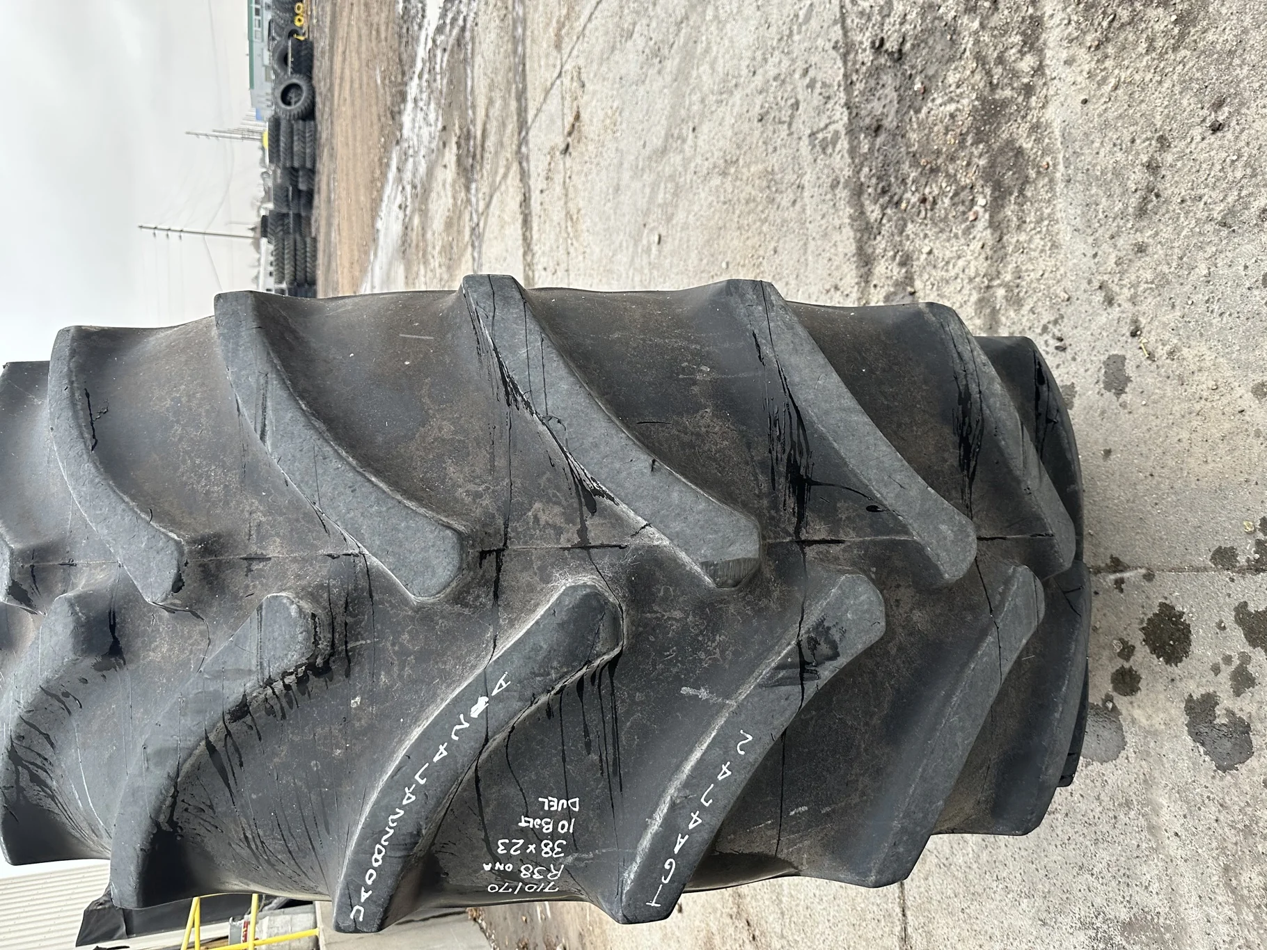 Used 75% 710/70R38 Firestone Radial All Traction DT R-1W (166B) TL on a 23 x 38 CIH Silver 10 Bolt image 4