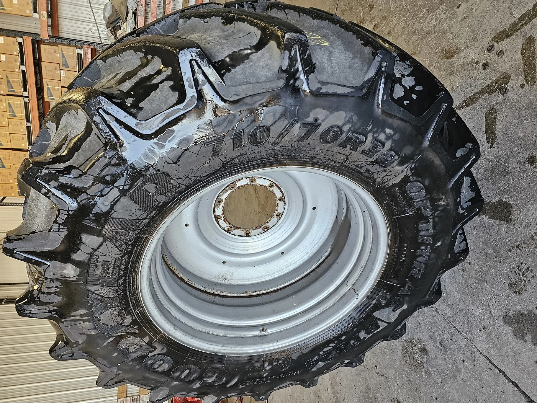 Used 710/70R38 166D Goodyear Optitrac R-1W TL 85% on 23 x 38 (10-13-11) Case Silver Wheel
