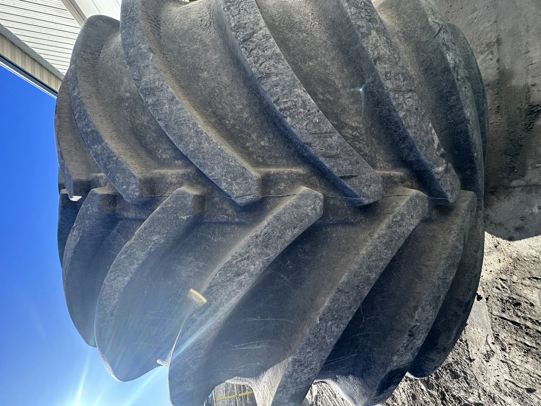Used 80% LSW 1250/35R46 Goodyear Optitrac R-1W (195D) TL on a 44 x 46 JD Yellow 10 Bolt Combin