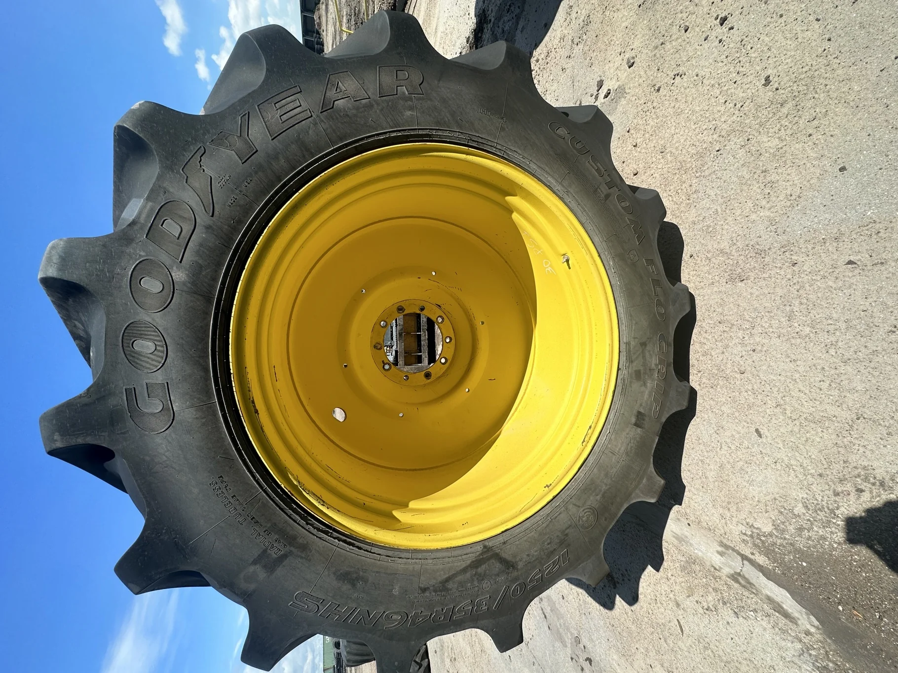 Used 90% LSW1250/35R46 Goodyear Custom Flo Grip R-2 (195B) TL on a 38 x 46 JD Yellow 10 Bolt C image 2