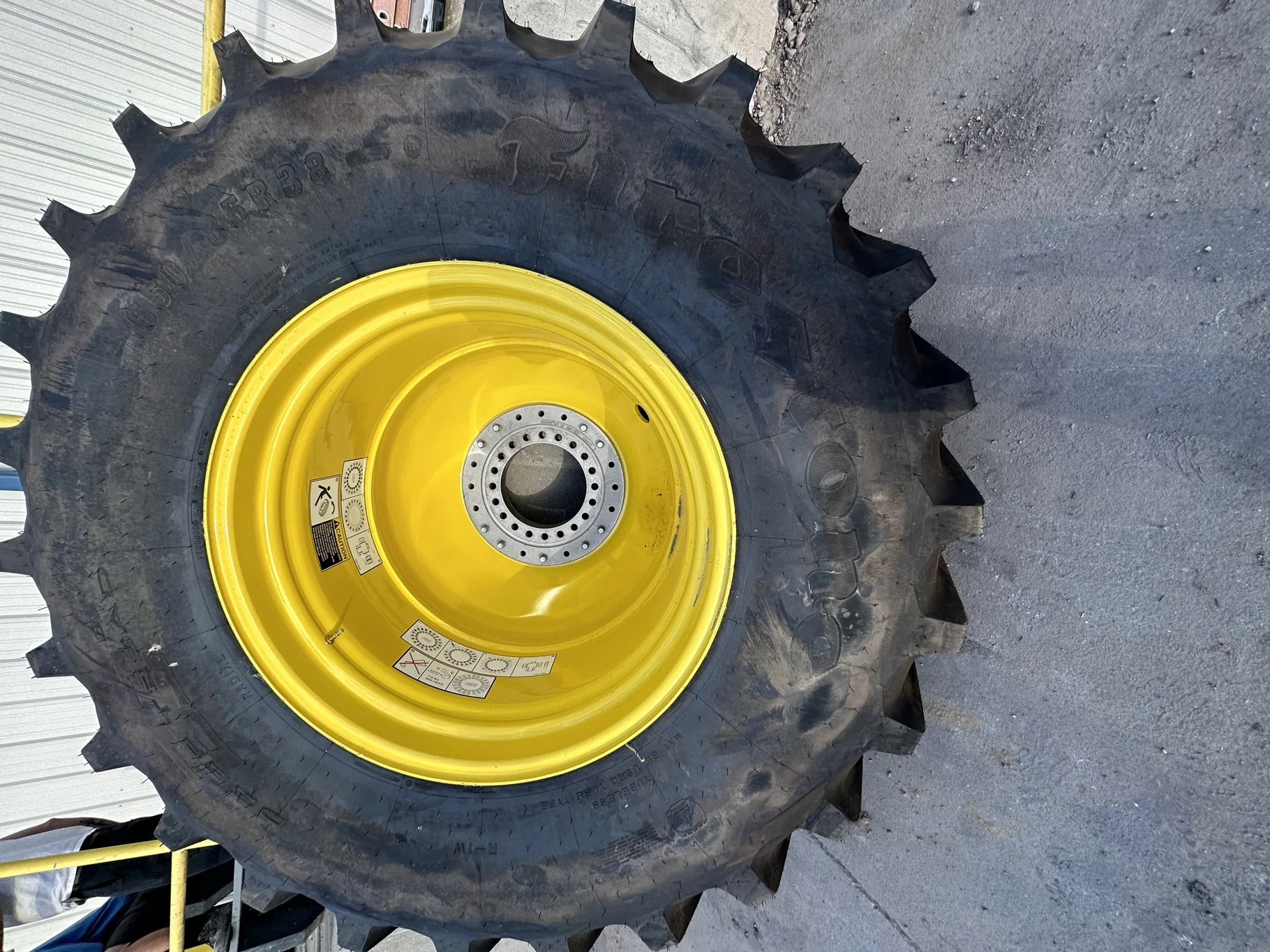 Take Off 650/85R38 Firestone Radial Deep Tread 23 R-1W 173B TL on a 23 X 38 JD Yellow  "X" Se