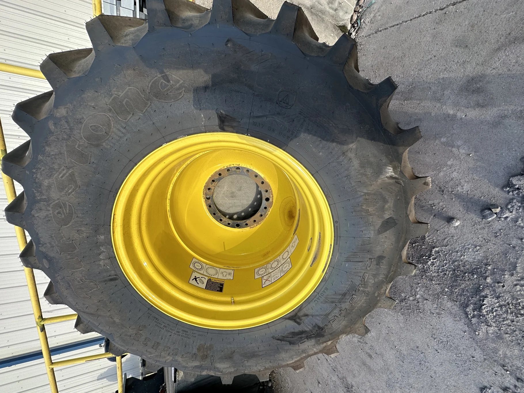 Take Off 650/85R38 Firestone Radial Deep Tread 23 R-1W 173B TL on a 23 X 38 JD Yellow "X" Ser
