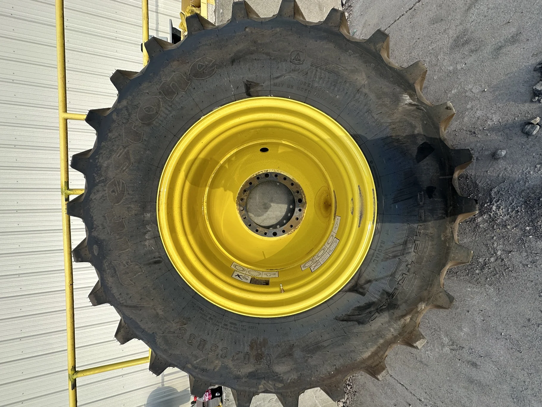 Take Off 650/85R38 Firestone Radial Deep Tread 23 R-1W 173B TL on a 23 X 38 JD Yellow "X" Ser image 2
