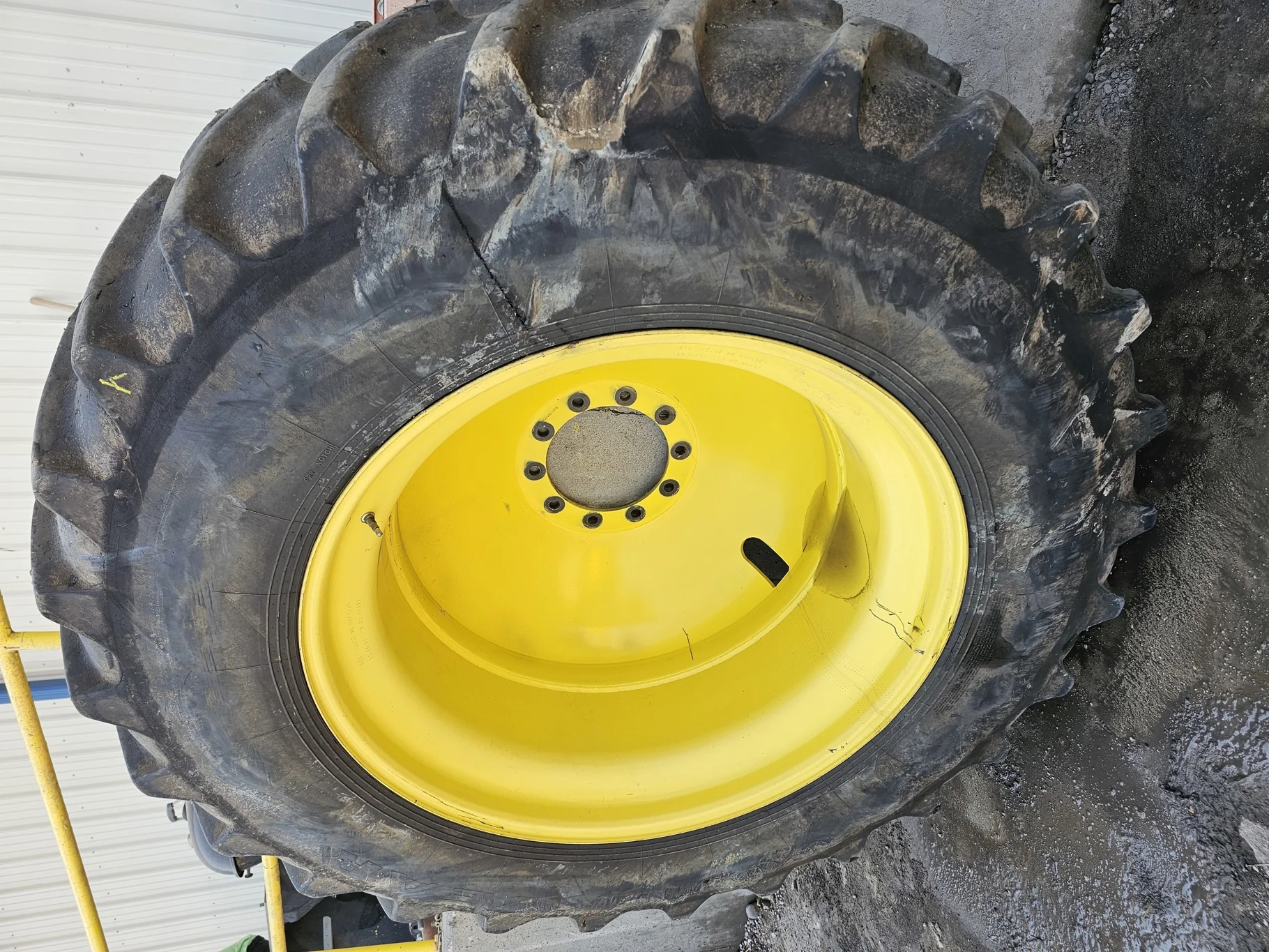 Used 75% 520/85R42 Goodyear Ultratorque 157A8 R-1W TL on a 18 x 42 JD Yellow 10 Bolt Outside D