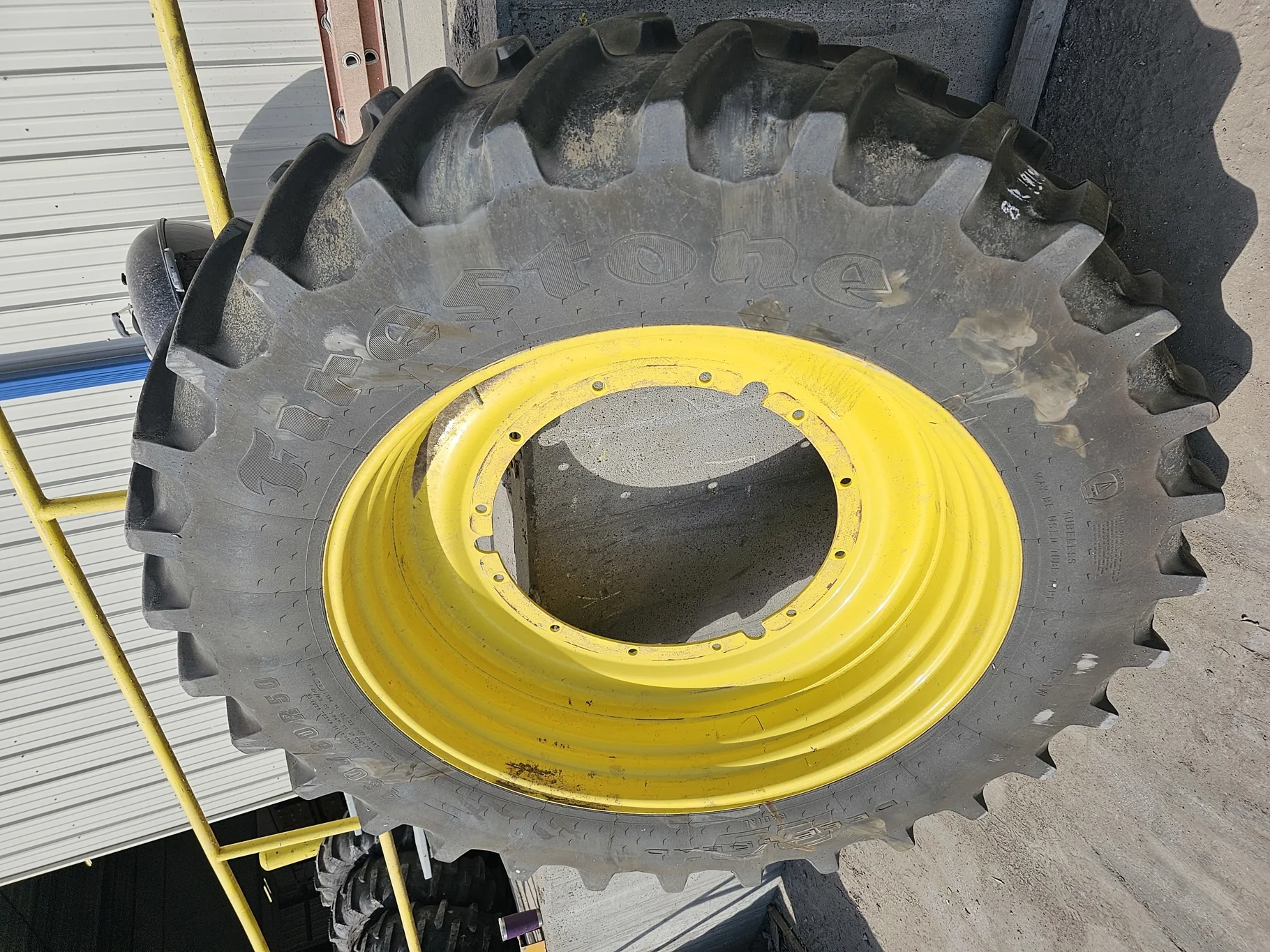 Used 75% 480/80R50 Firestone Radial Deep Tread 23 R-1W 159B TL on 15 x 50 John Deere Yellow 12 Bolt