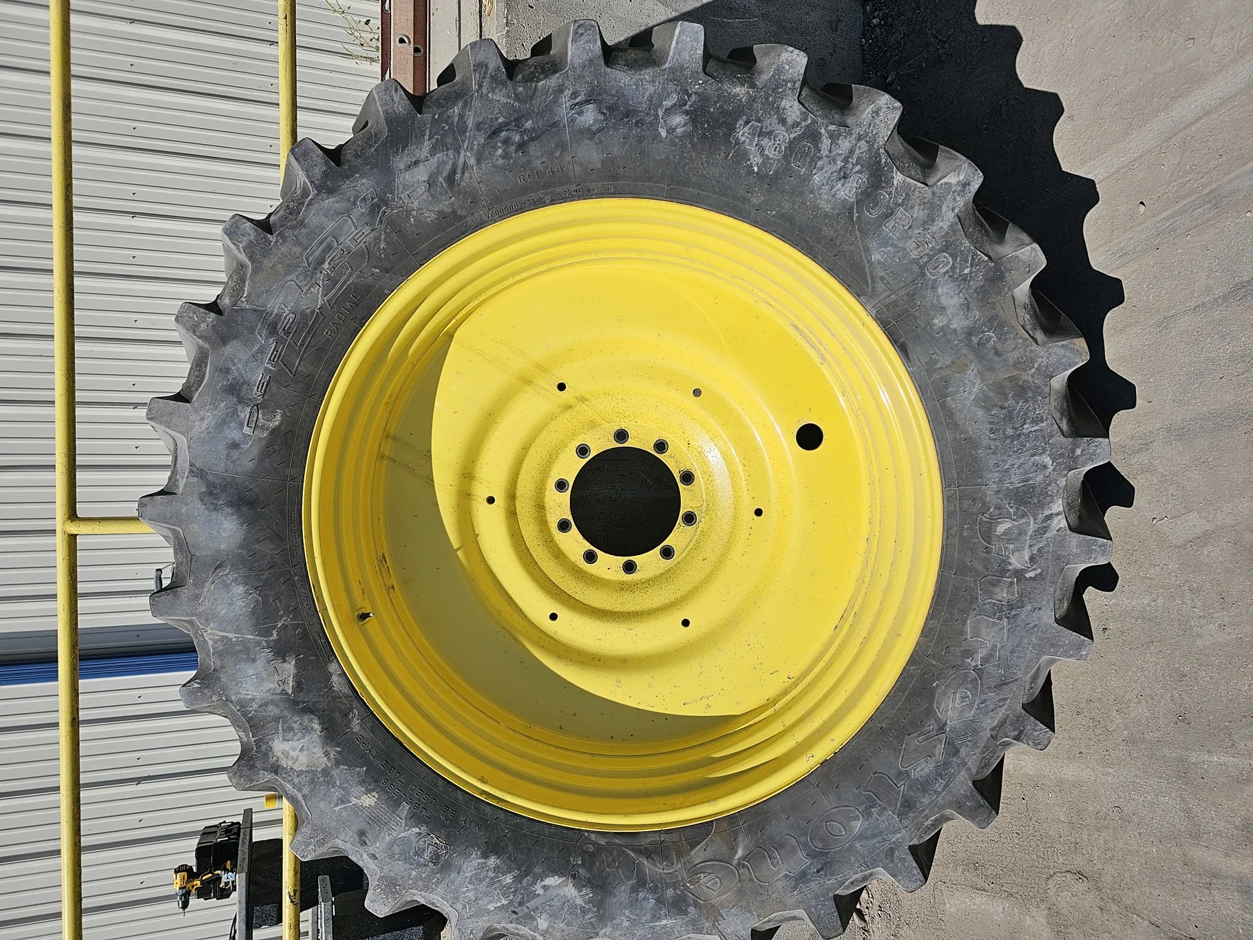 Used 75% 480/80R50 Firestone Radial Deep Tread 23 R-1W 159B TL on 15 x 50 John Deere Yellow 10 Bolt image 2