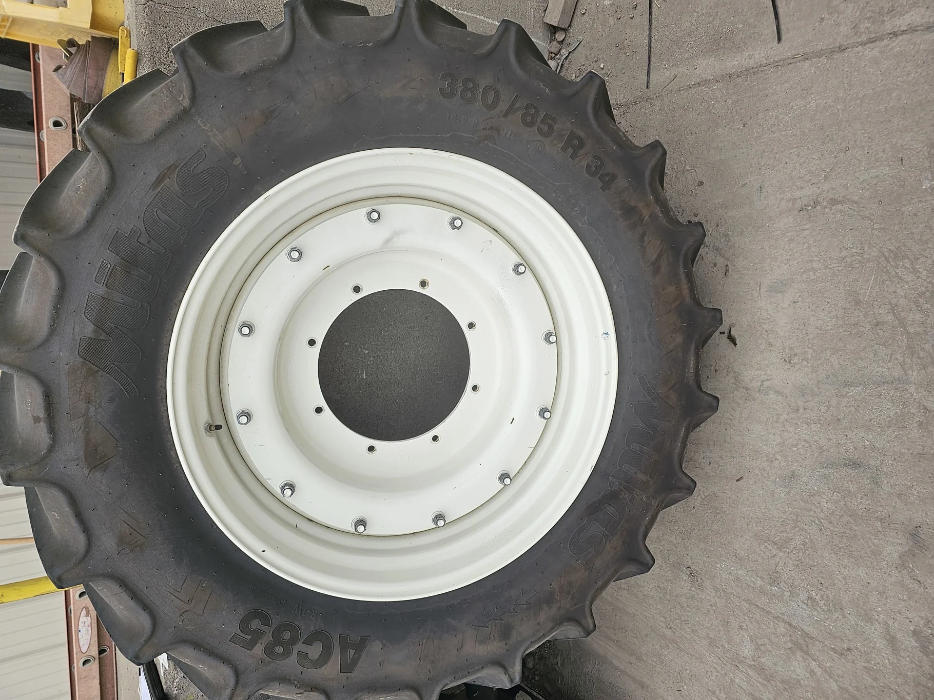 Used 90% 380/85R34 Mitas AC85 R-1W 146A8 on a 13 x 34 NH White 8 Bolt Waffle Wheel Assembly - Excell image 2