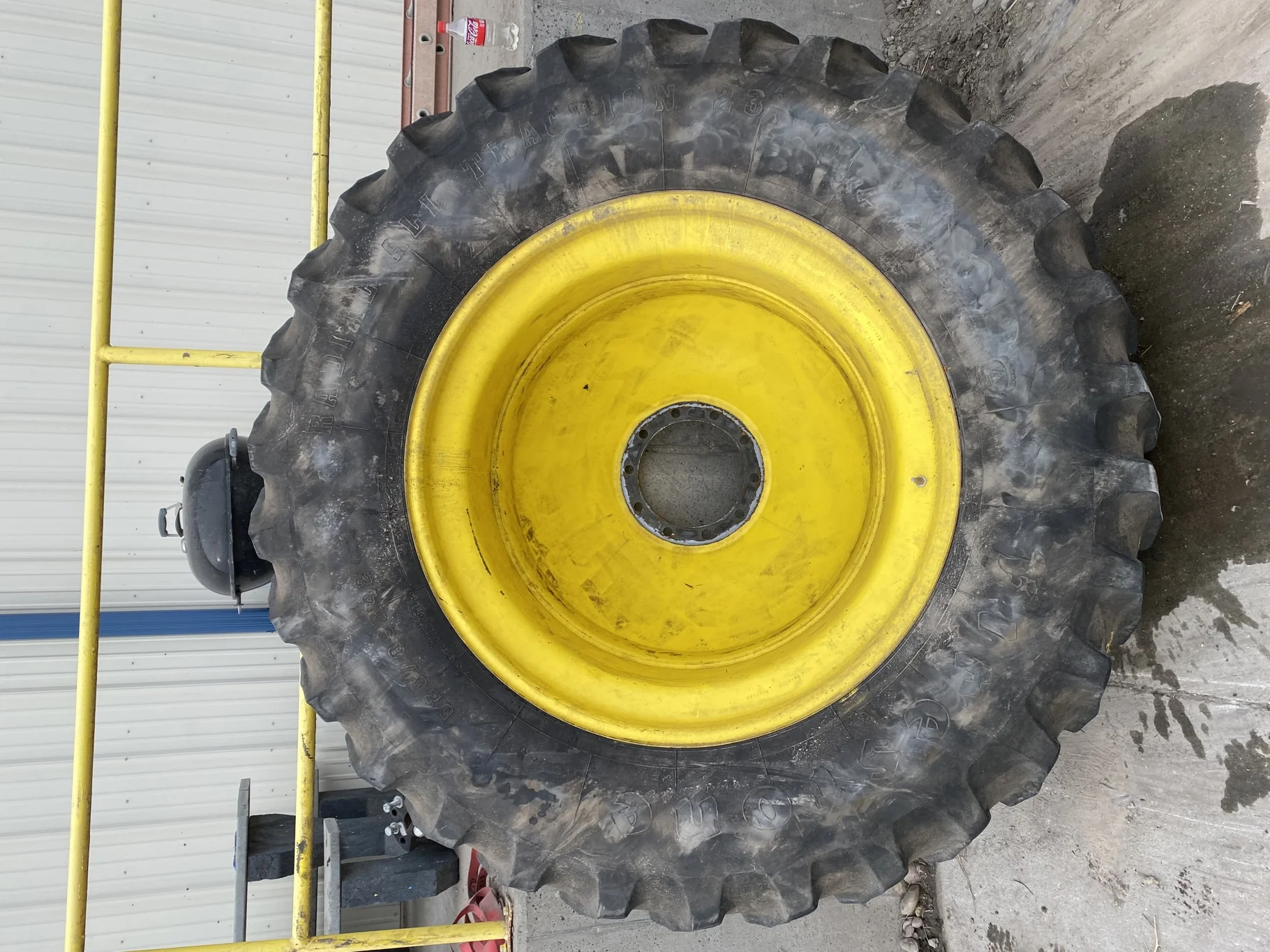Used 75% 520/85R42 Firestone Radial All Traction R-1W 157B TL on 18 x 42 JD Yellow 10 Bolt Dolly