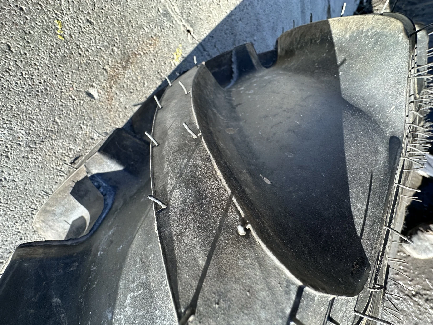 Take Off 320/85R24 Optitrac R-1W 122D TL on a 10 X 24 Kubota Orange Waffle Wheel (2 Bolt) with a