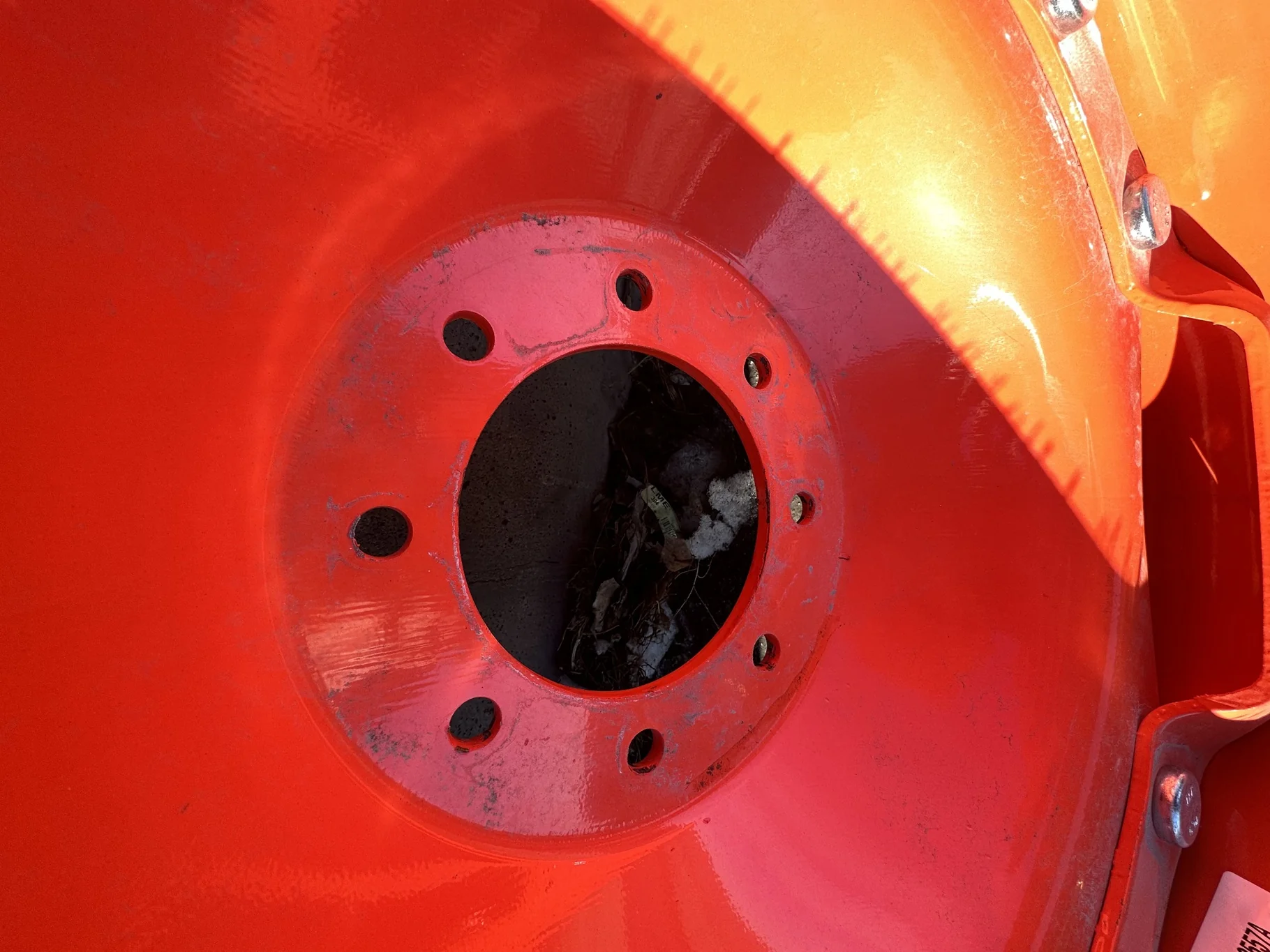Take Off 320/85R24 Optitrac R-1W 122D TL on a 10 X 24 Kubota Orange Waffle Wheel (2 Bolt) with a image 4