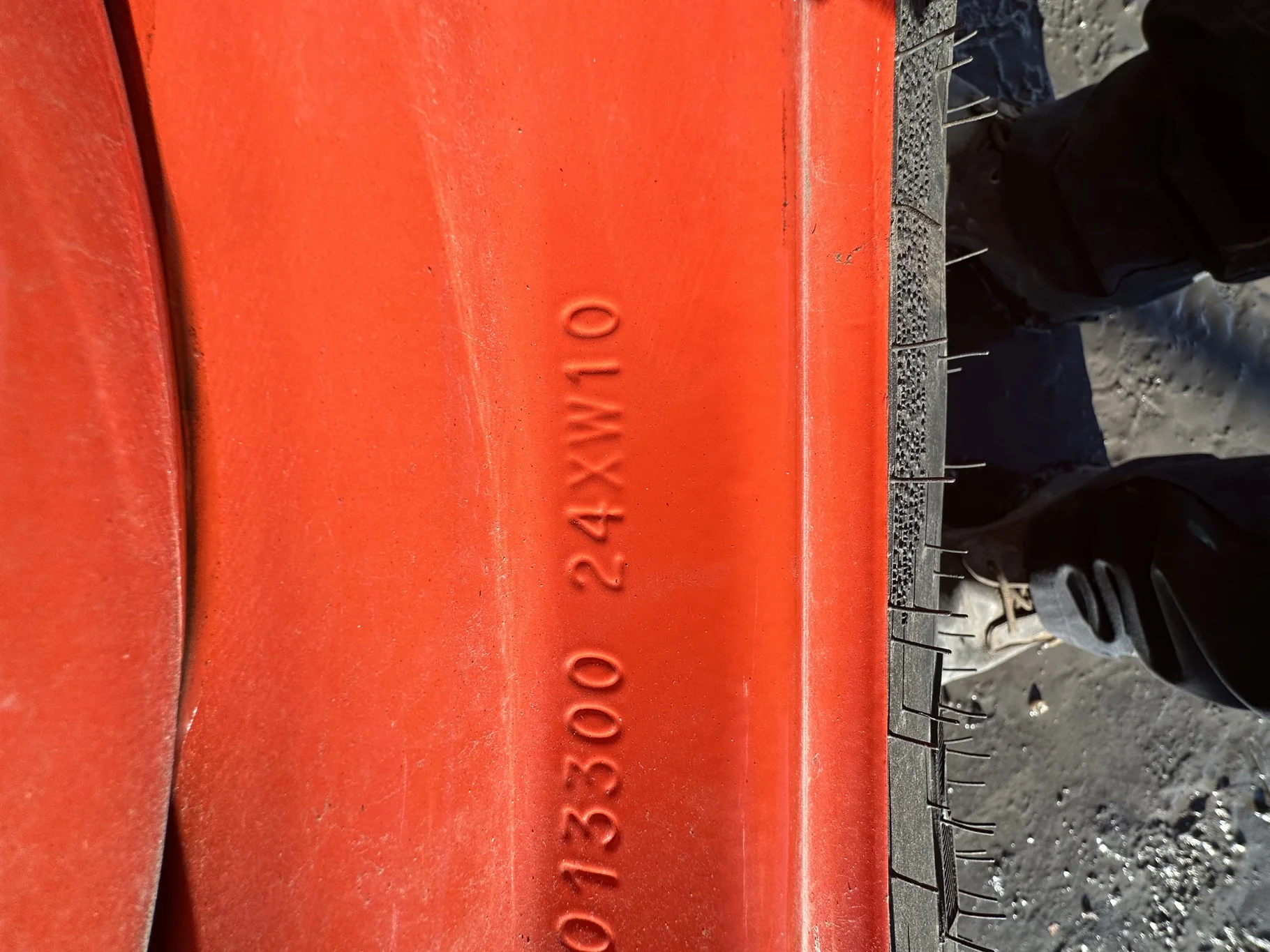 Take Off 320/85R24 Optitrac R-1W 122D TL on a 10 X 24 Kubota Orange Waffle Wheel (2 Bolt) with a image 6