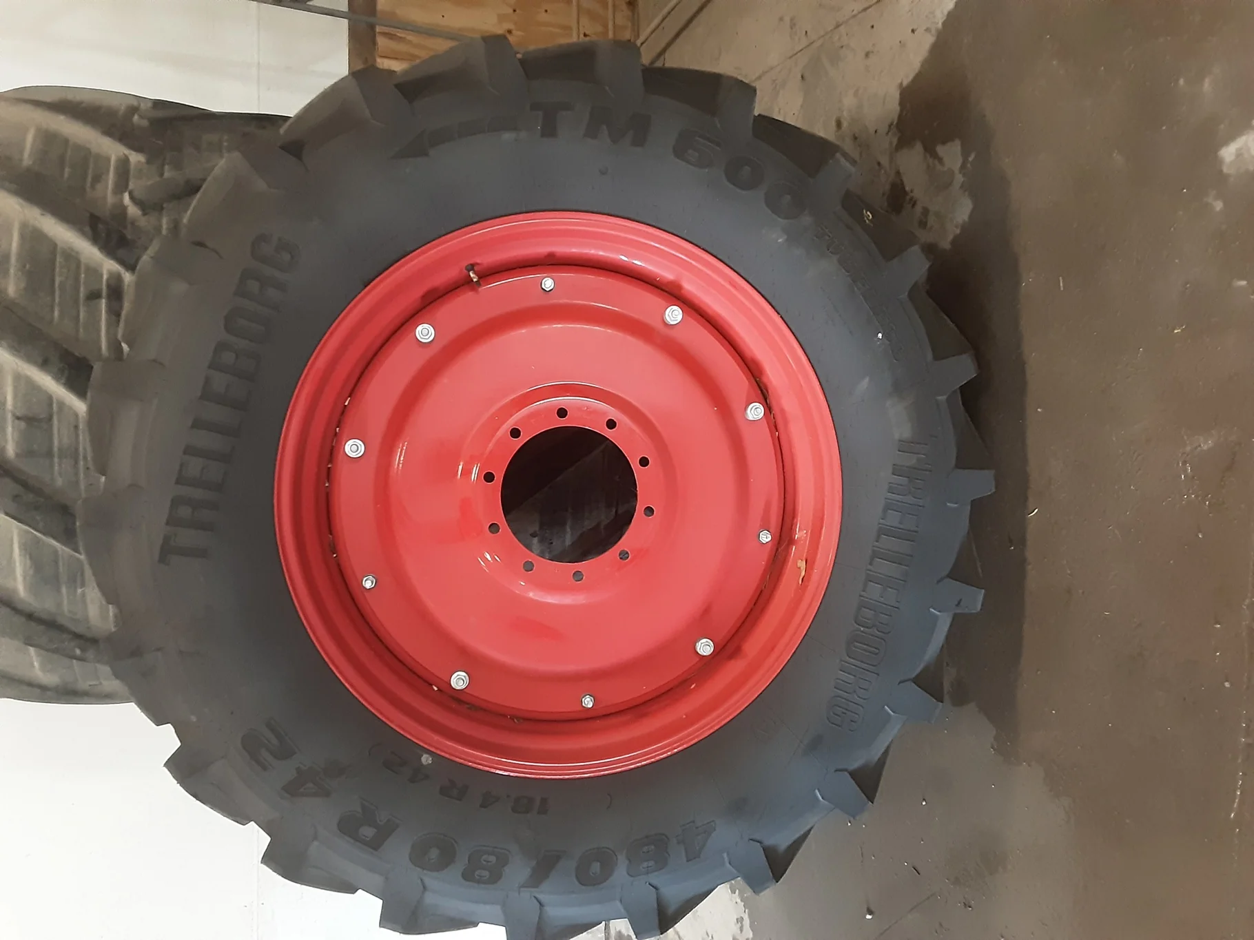TAKE OFF 480/80R42 Trelleborg TM600 R-1W 151A8 TL on a 16 X 42 Fendt Red 12 Bolt 2 Piece Dual Whe