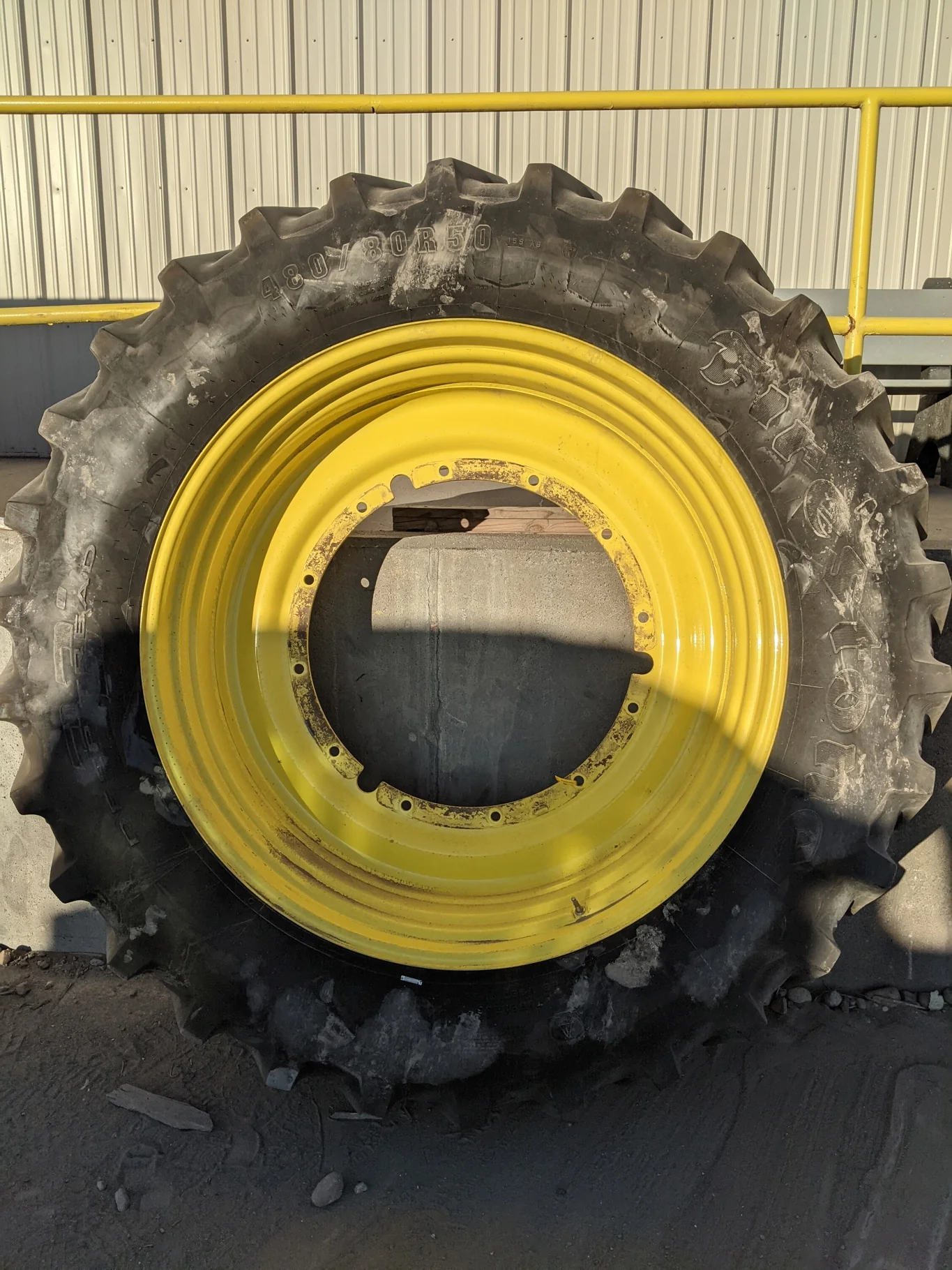 Used 65% 480/80R50 Firestone Radial Deep Tread 23 R-1W (159B) TL on a 15 x 50 JD Yellow Stub D image 2