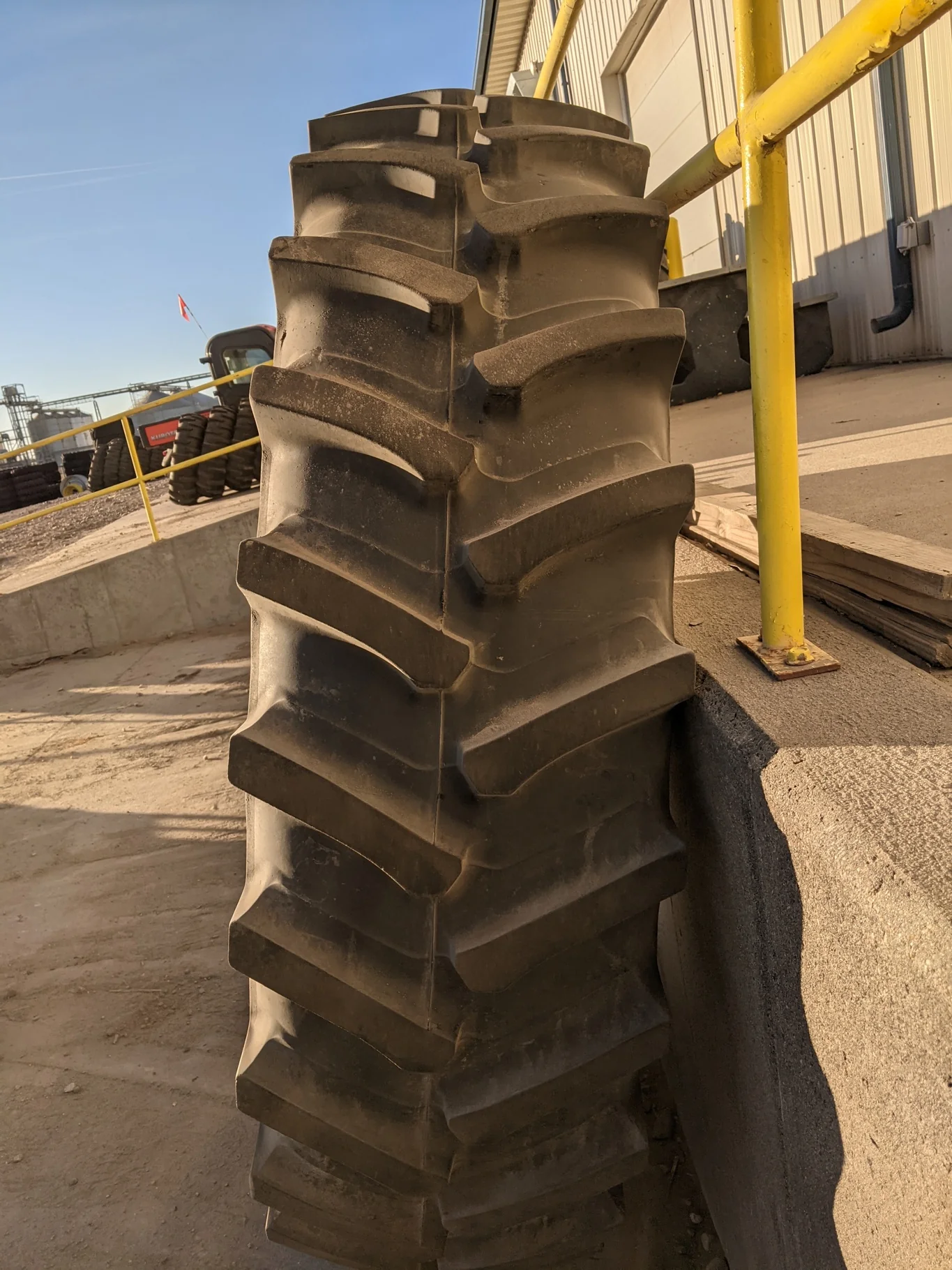 Used 65% 480/80R50 Firestone Radial Deep Tread 23 R-1W (159B) TL on a 15 x 50 JD Yellow Stub D image 4