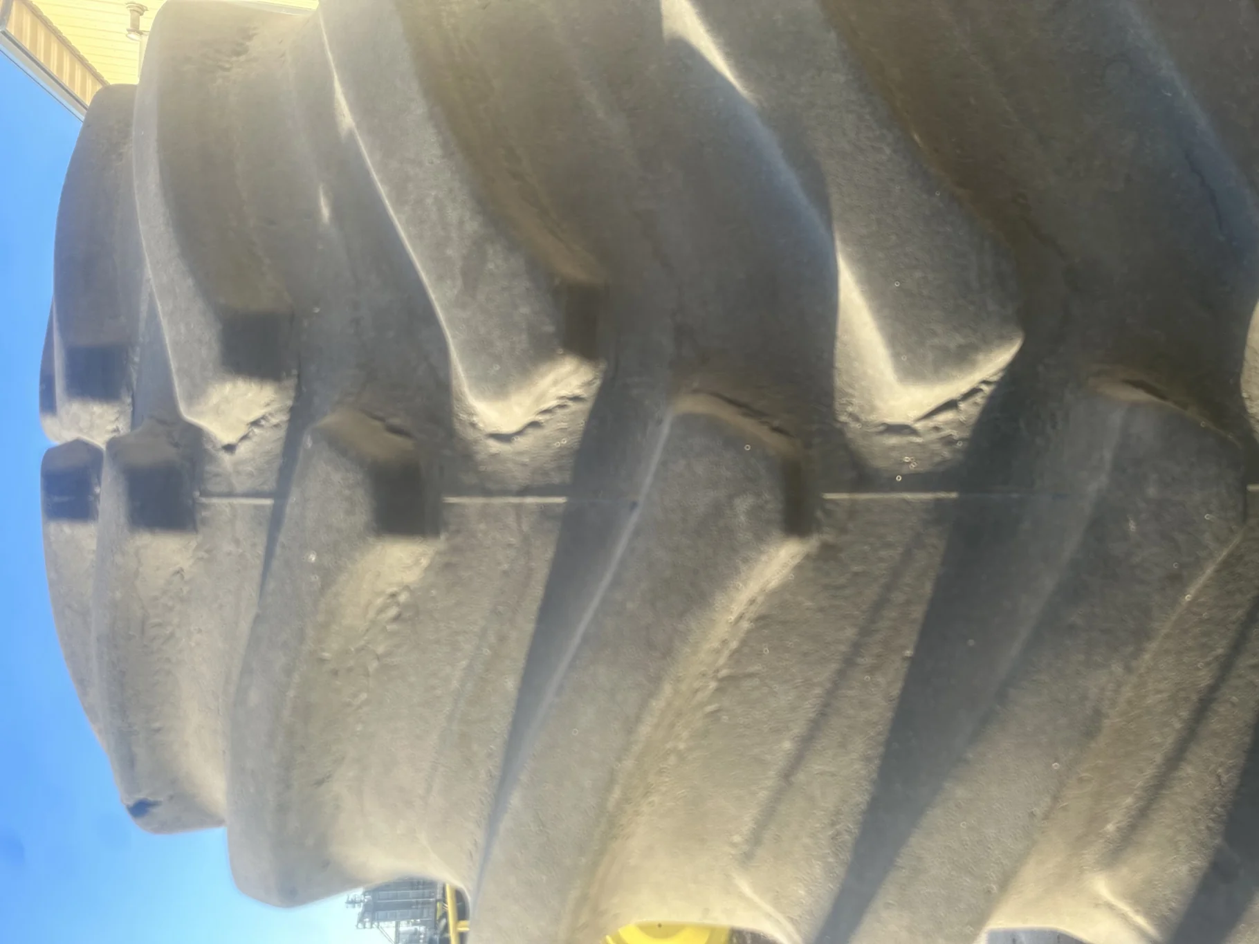 Used 85% IF800/70R38 Firestone Deep Tread  23 R-1W 173D TL on a 27 x 38 JD Yellow 10 Bolt Combine Wh image 3