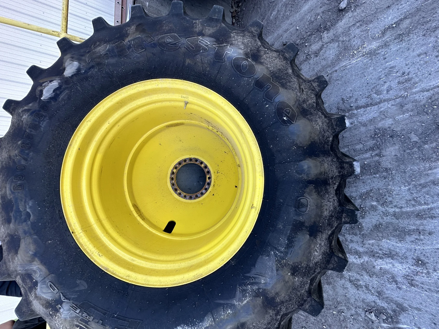 Used 87% 650/85R38 Firestone Radial Deep Tread 23 R-1W 173B TL on 23 x 38 John Deere Yellow 20 Bolt image 2