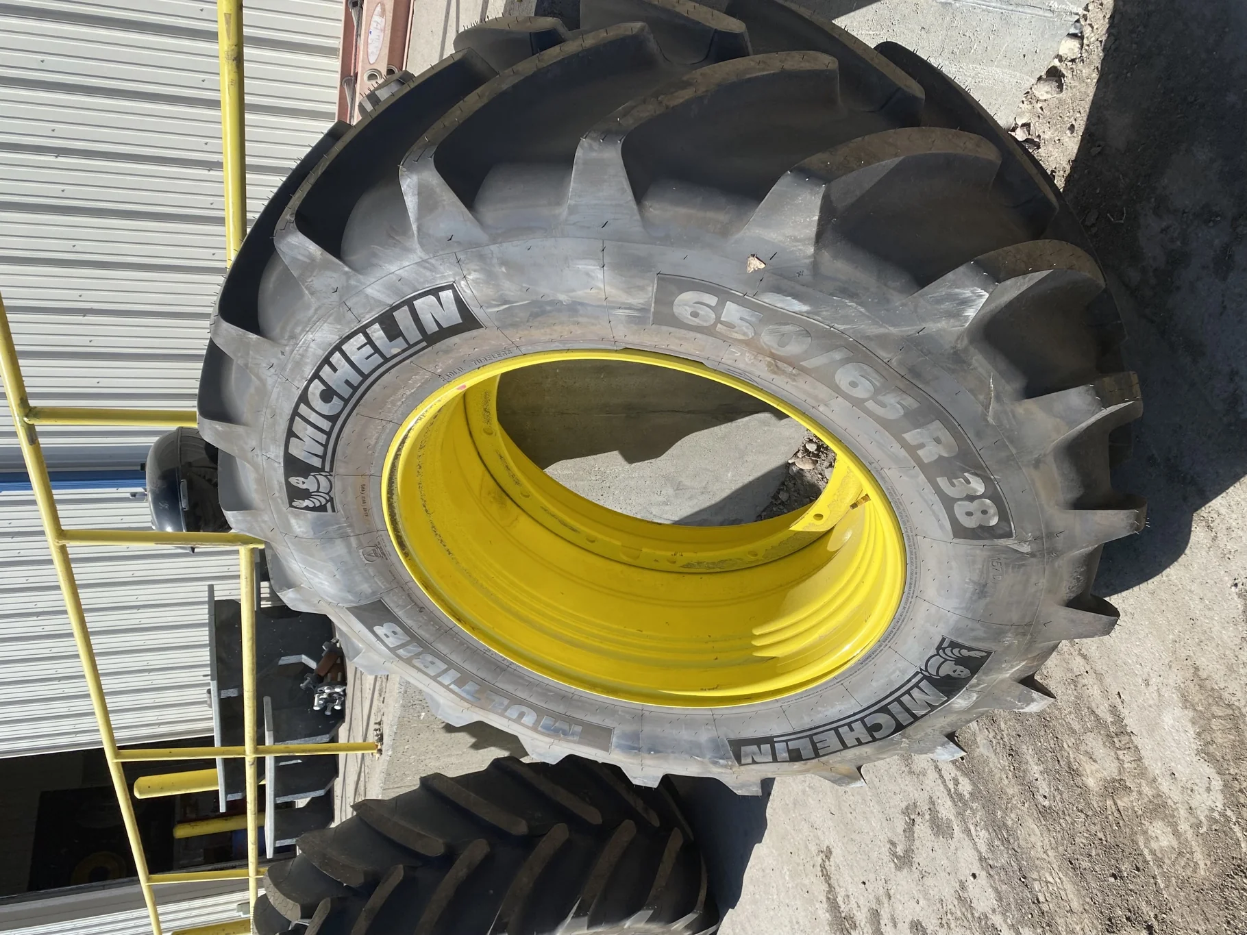 Take Off 650/65R38 Michelin MultiBib R-1W 157D TL on a 20 X 38 John Deere Yellow 12 Bolt (.937) Spra