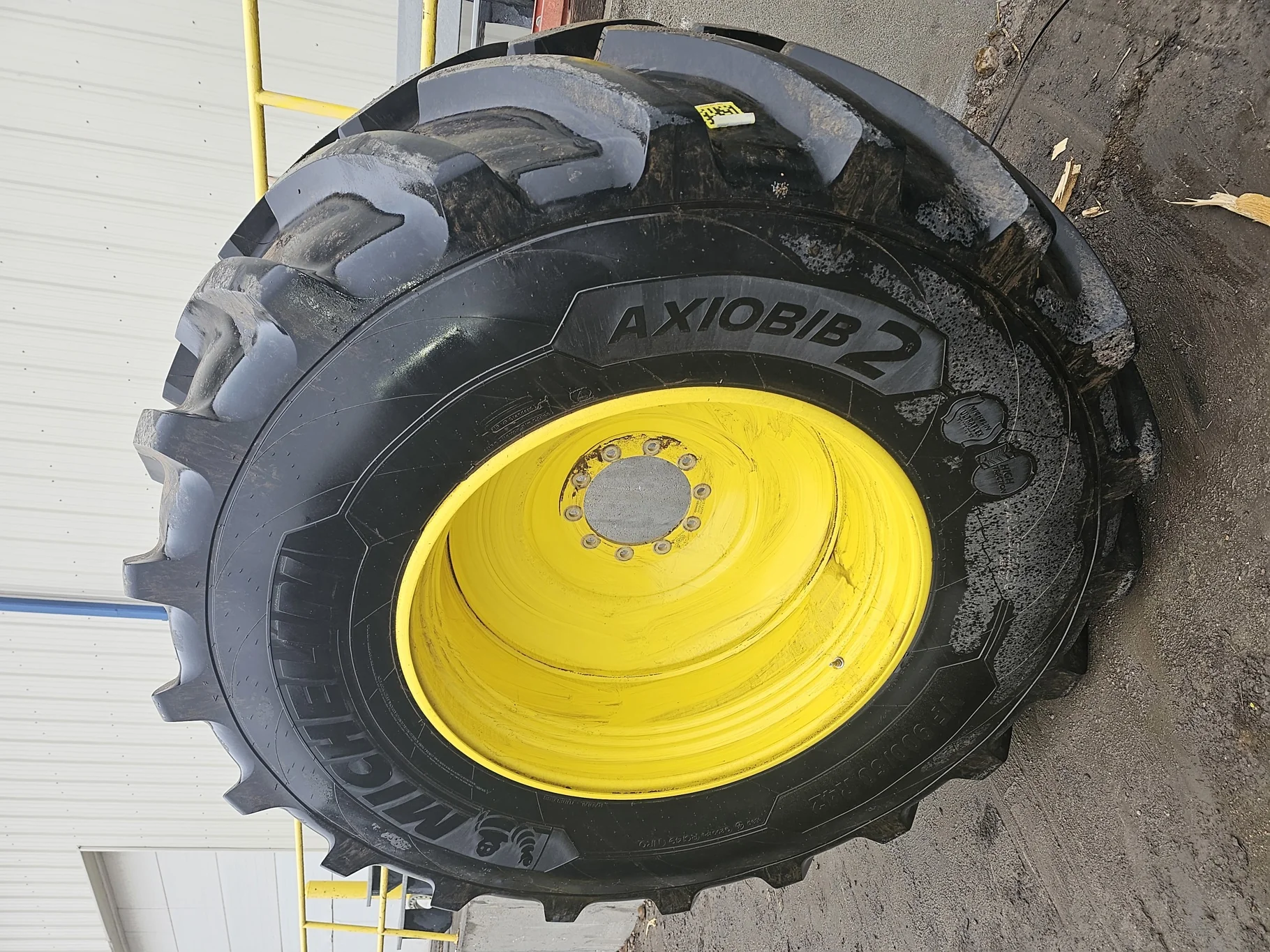 Used 95% VF900/60R42 Michelin Axiobib 2 (189D) on a 30 x 42 John Deere Yellow 10 Bolt(.906) 5/8 Form