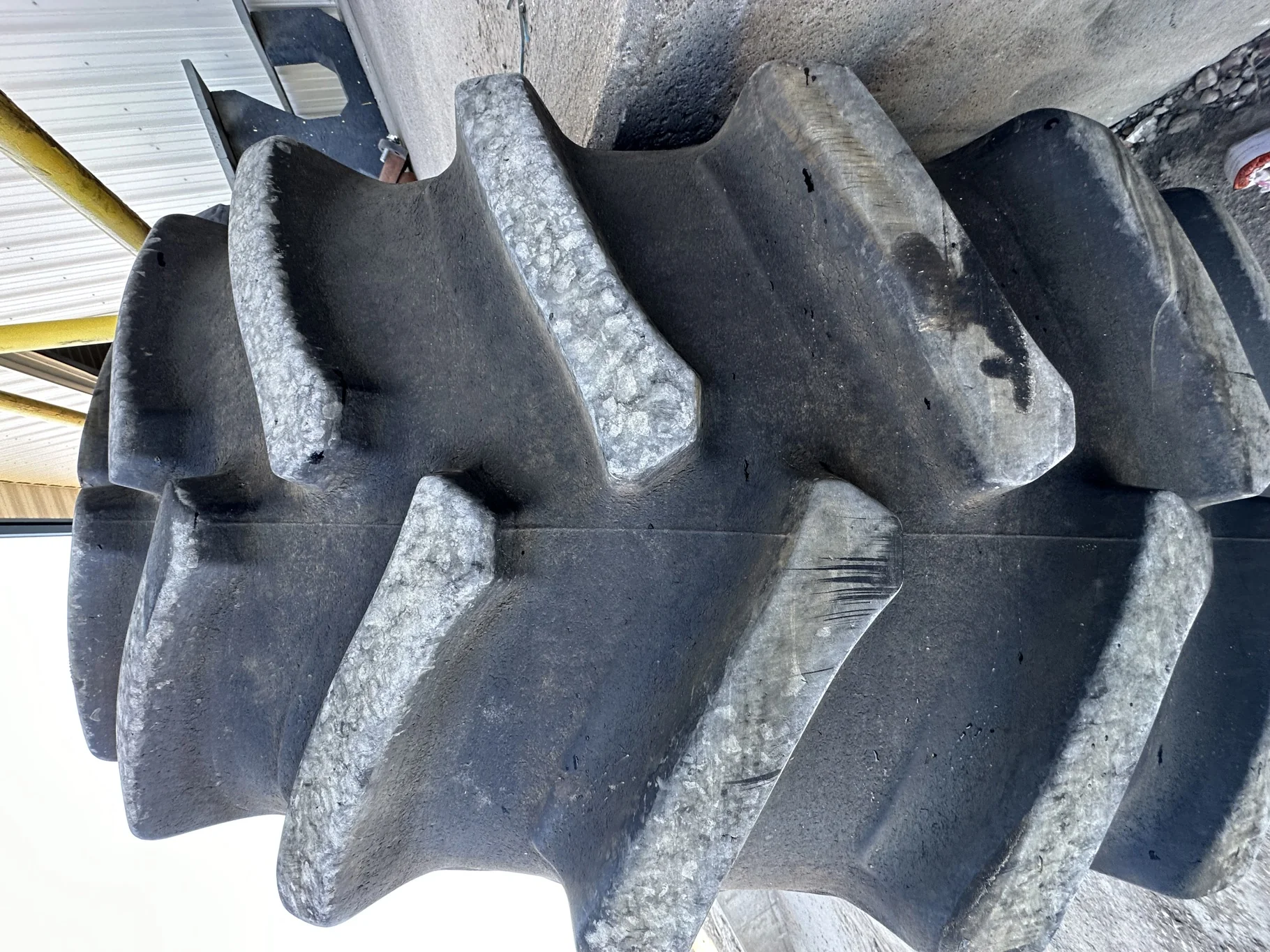 Used 80% 650/85R38 Firestone Radial Deep Tread 23 R-1W 173B TL on a 23 x 38 JD 10 Bolt Outside Dolly image 4