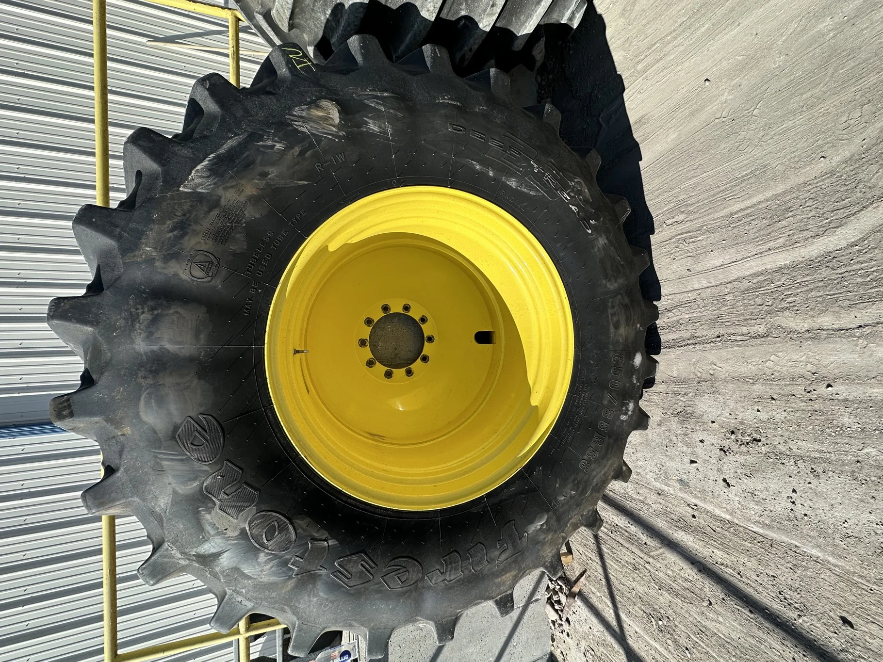 Used 85% 650/85R38 Firestone Radial Deep Tread 23 R-1W 173B TL on a 23 x 38 JD 10 Bolt Inside DD image 2