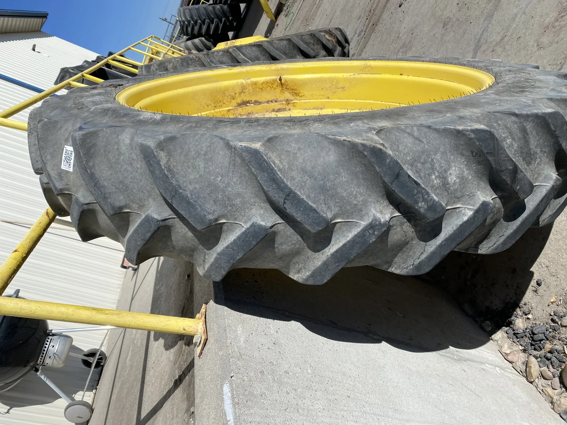 Used 60% 380/90R54 Goodyear Super Traction Radial R-1W 152A8/B TL on a 12 x 54 JD Yellow 10 Bo image 3
