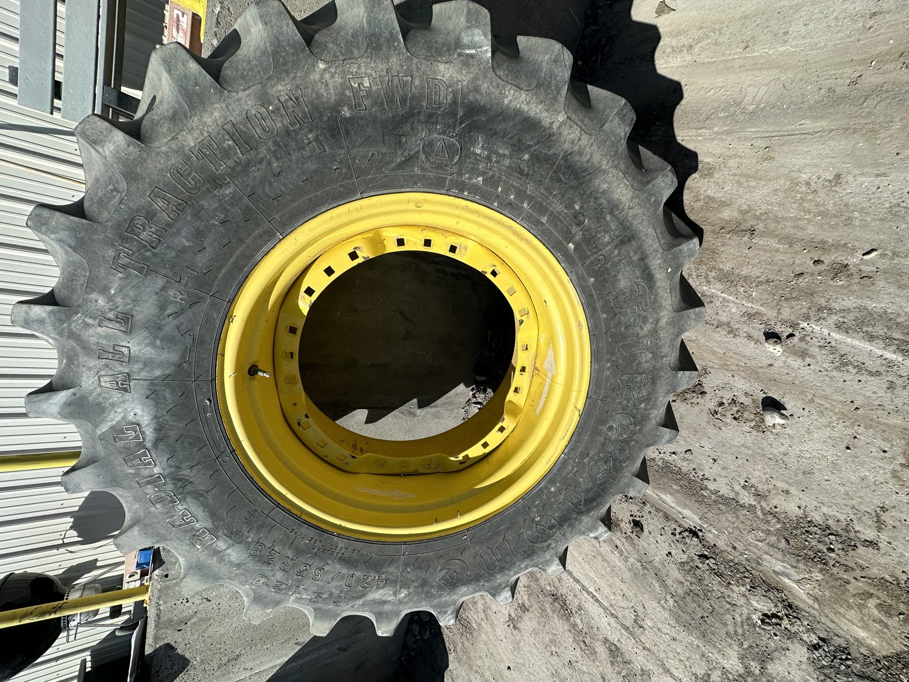 Used 420/85R28 139B Firestone RAT FWD TL R-1 on a 12 X 28 John Deere Yellow Waffle Wheel image 3