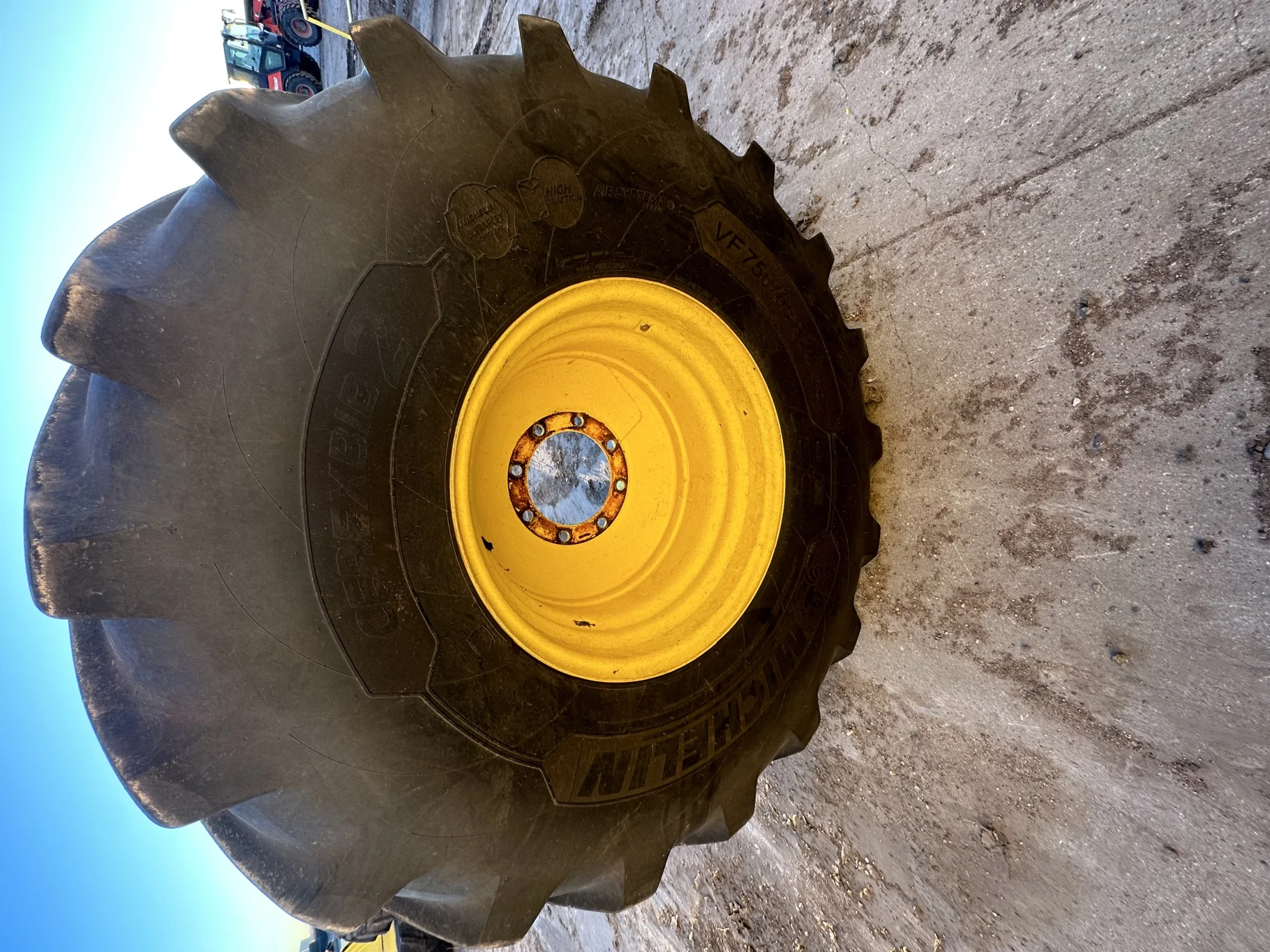 Used 80% VF750/65R26 CFO+ Michelin CerexBib 2 R-1W 180A8 TL on a 25 x 26 JD Yellow 8 Bolt (.90 image 2