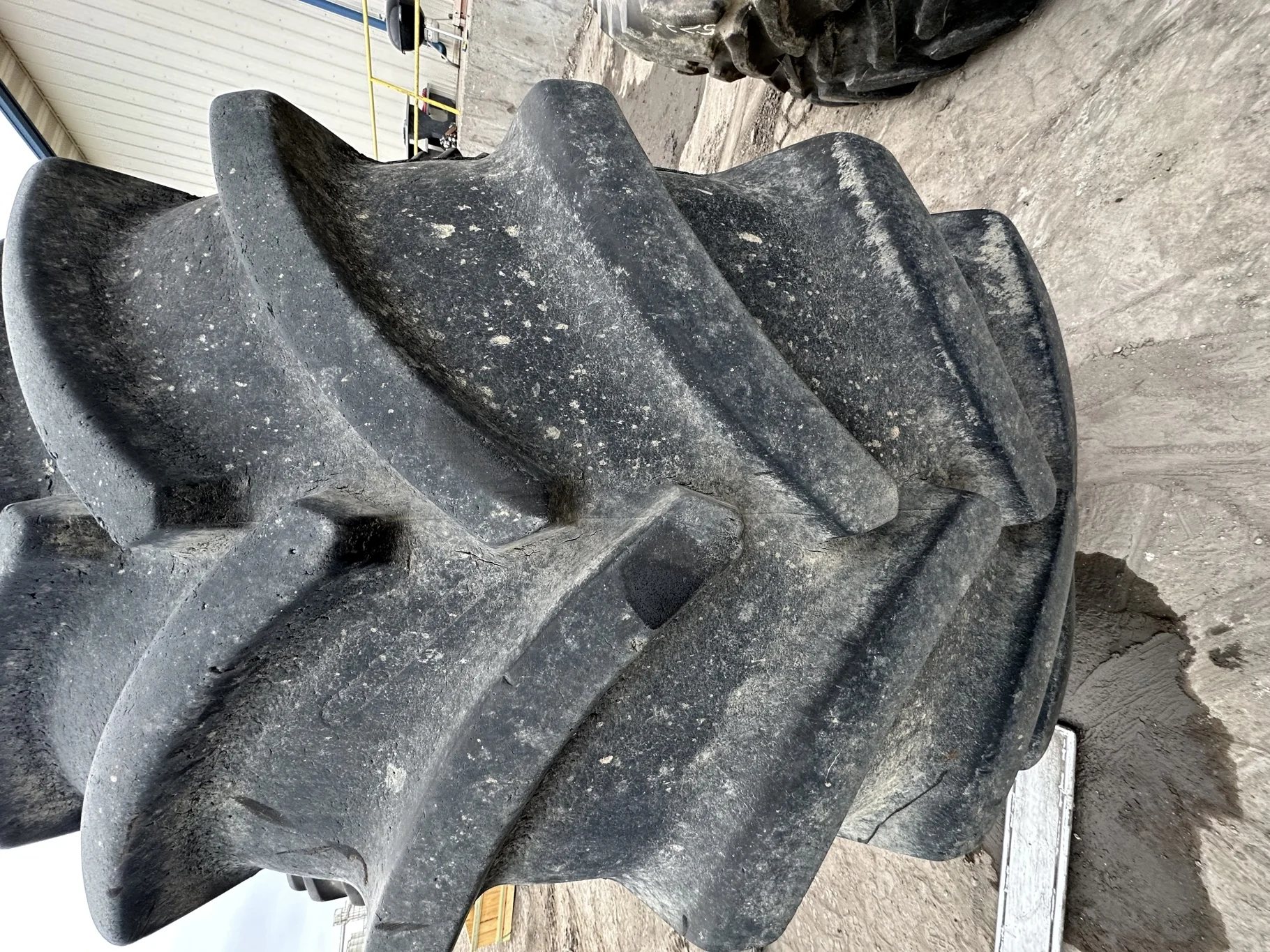 Used 75% IF800/55R46 Goodyear Optitrac DT830 R-1W (182D) TL on a 28 x 46 JD Yellow 12 Bolt Stu