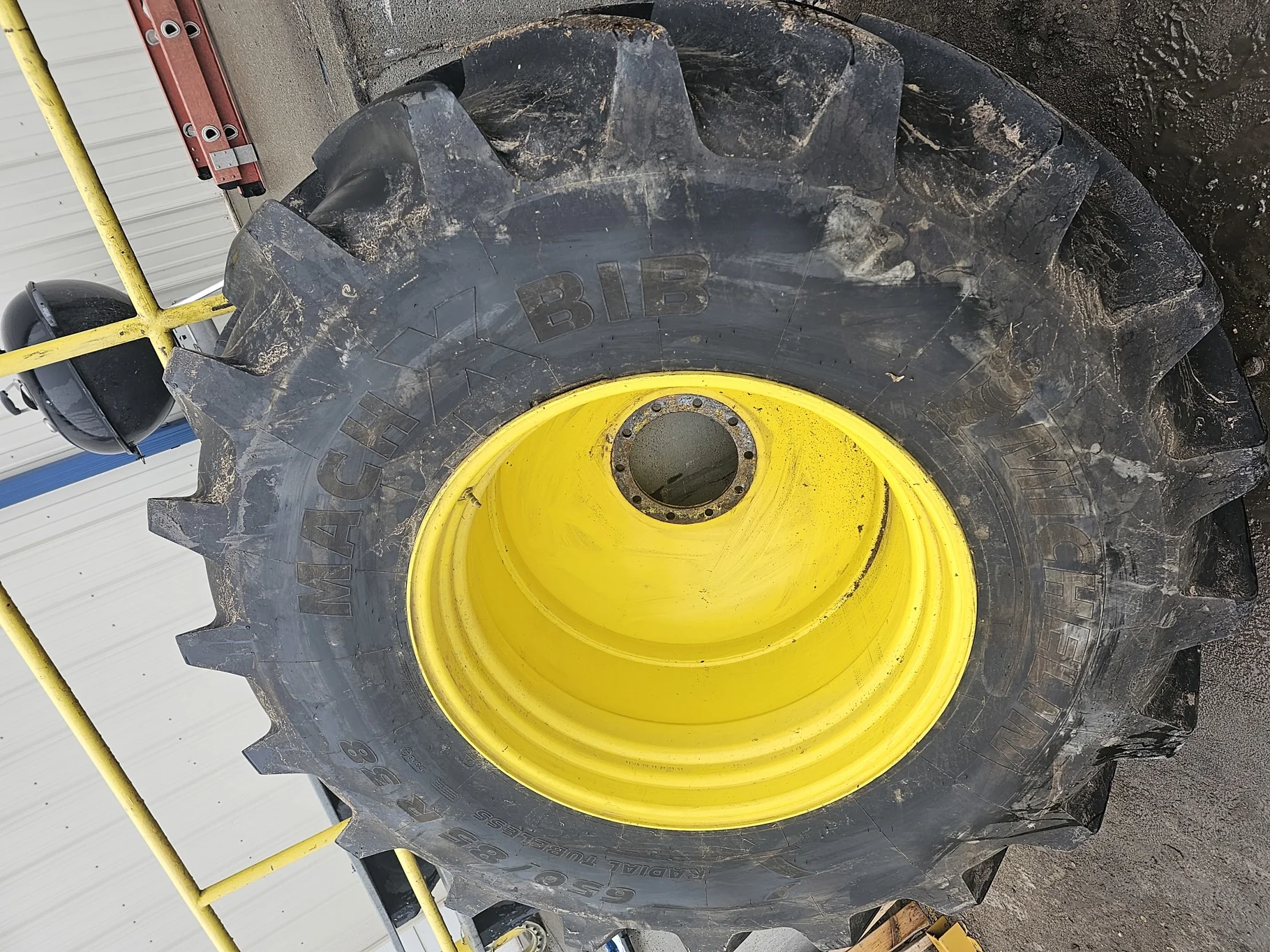 Used 95% 650/85R38 MIchelin Mach X Bib  173B R-1W TL on a 23 x 38 JD 10 Bolt Inside DD Wheel -