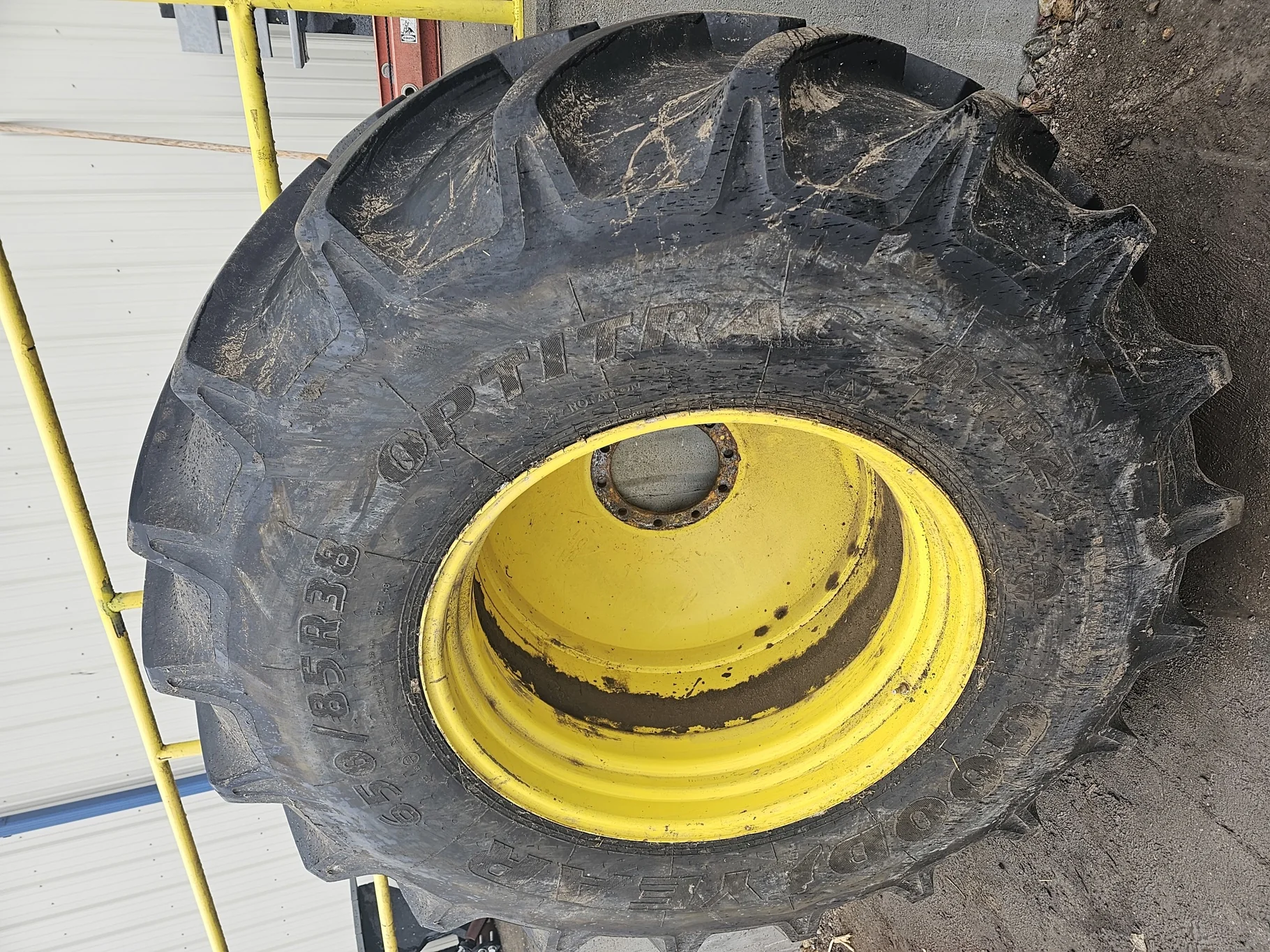 Used 90% 650/85R38Goodyear Optitrac (173A8/B) R-1W on 23 x 38 John Deere Yellow DD Wheel (10-1