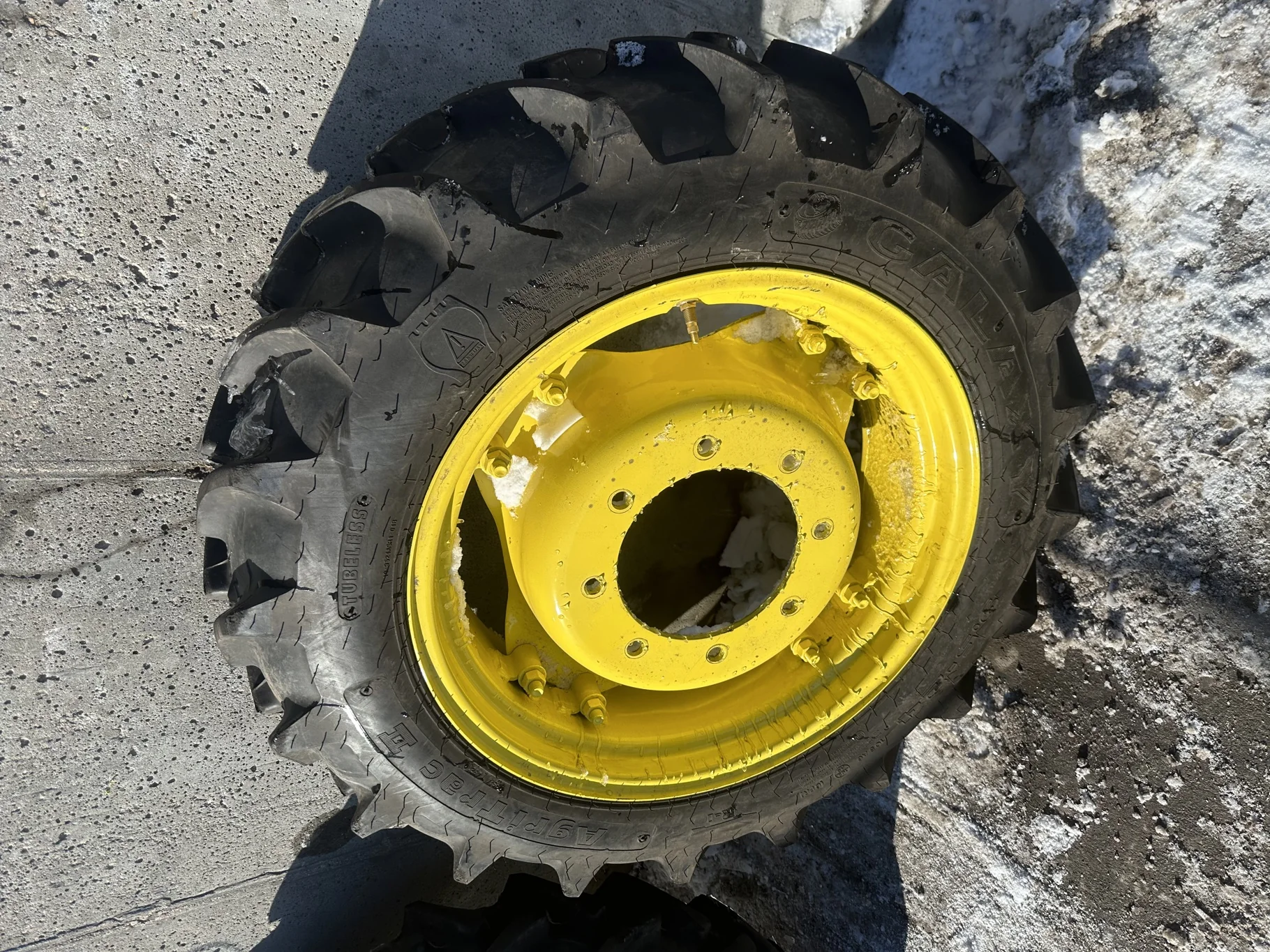 Used 98% 9.5-24 Galaxy Agritrac ii C(6Ply) R-1 TL on a 8 x 24 JD Yellow 8 Bolt w/ 2 bolt Waffl