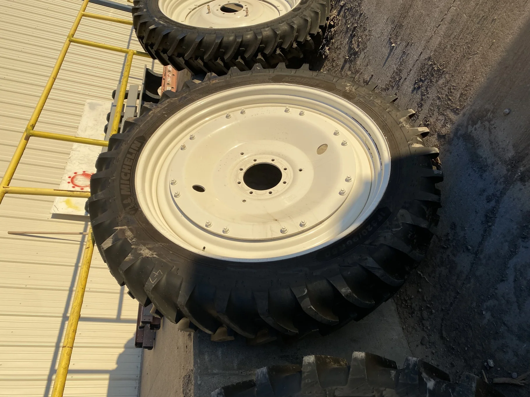 Take Off  IF 320/90R50 Michelin AgriBib Row Crop R-1W 158A8 TL on a 10 X 50 NH White 16 Bolt image 2