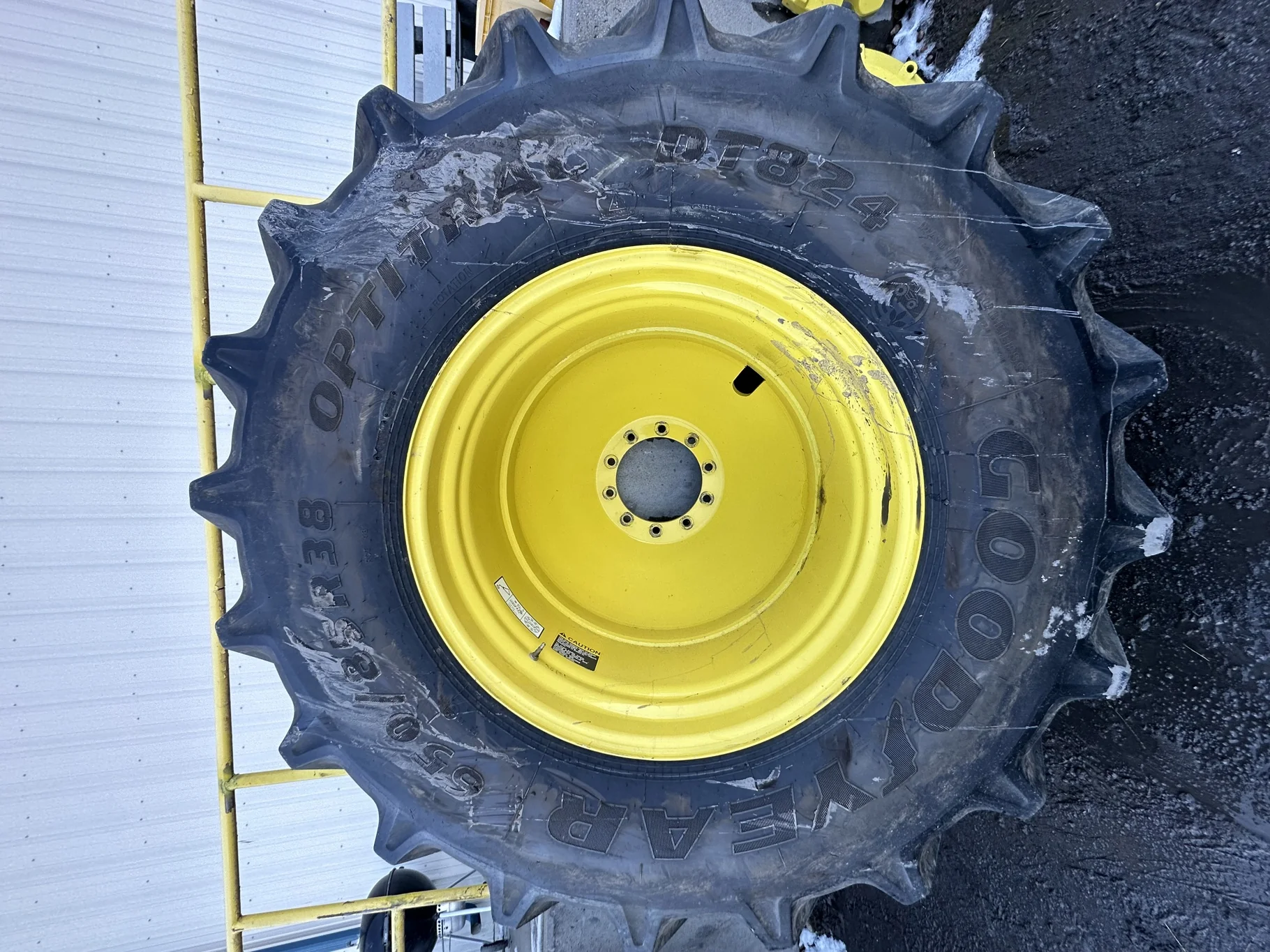 Used 90% 650/85R38 Goodyear Optitrac 173D R-1W TL on a 23 x 38 JD Yellow 10 Bolt Outside Dolly image 2