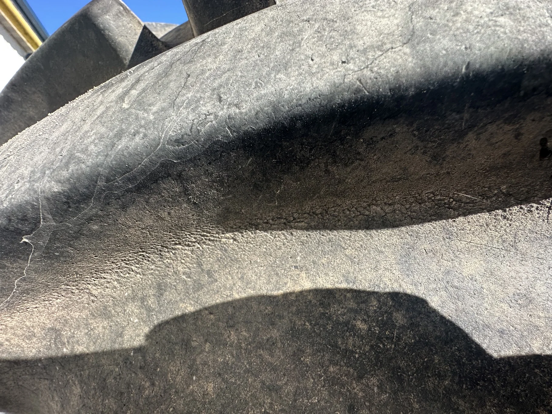 Used 90% 650/85R38 Goodyear Optitrac 173D R-1W TL on a 23 x 38 JD Yellow 10 Bolt Inside Dolly image 9