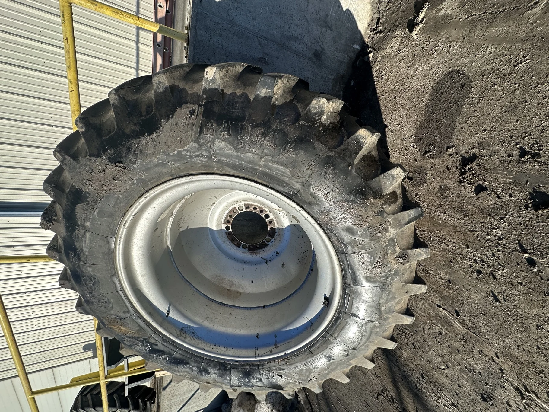 Used 73% 520/85R42 Firestone Radial All Traction 23 R-1W 157B TL on 18 x 42 Case IH Silver 20 Bol