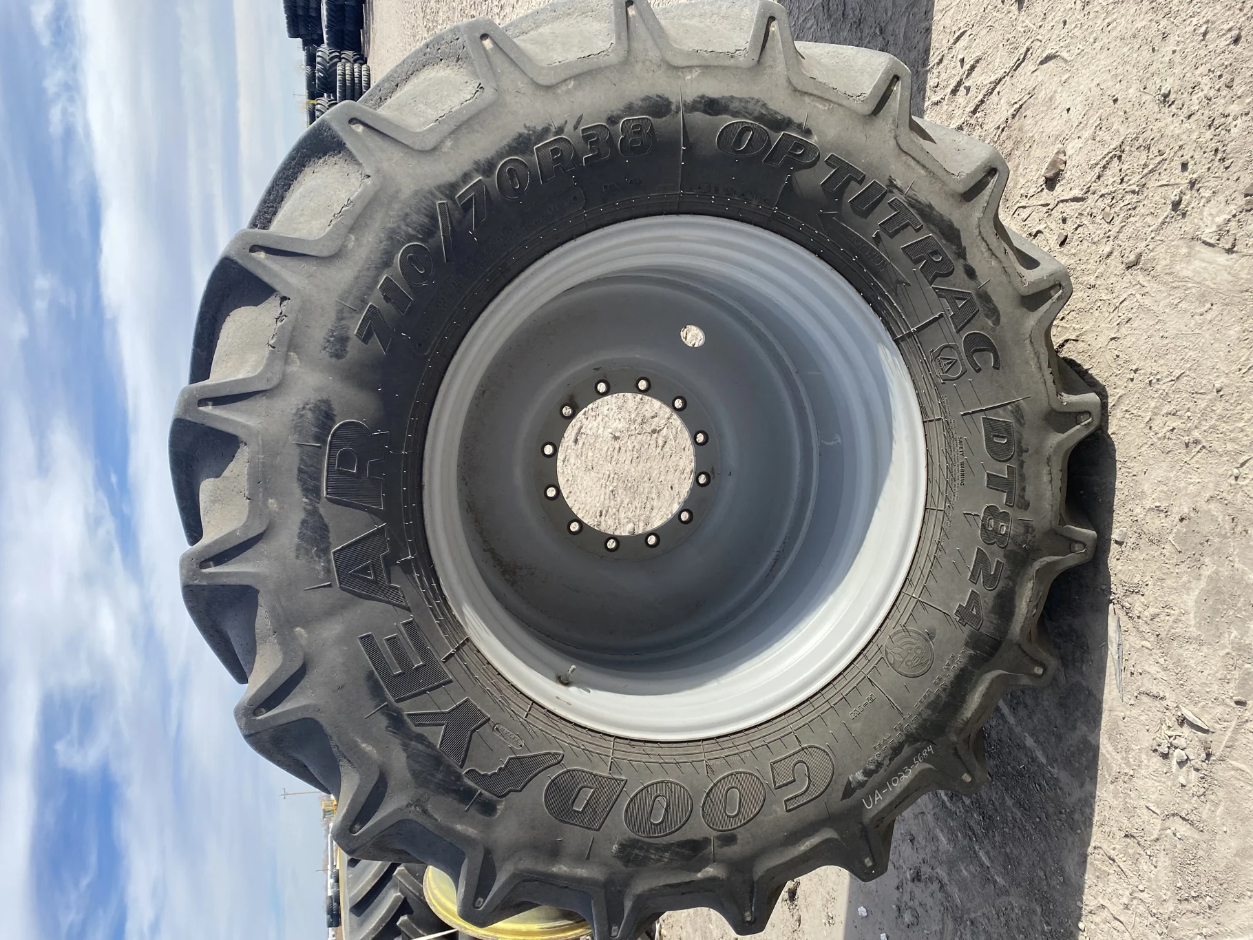 Used 80% 710/70R38 Goodyear Optitrac DT824 on a 23 x 38 Rogator 12 Bolt Sprayer Wheel (12-15.748-13.