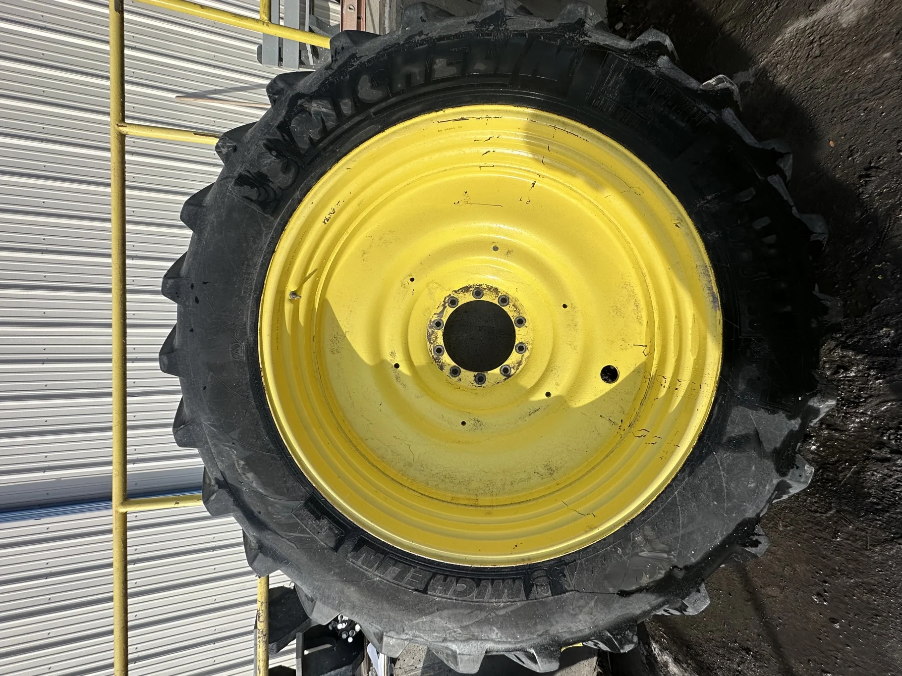 Used 65% VF480/80R50 Michelin YieldBib R-1W 166A8/166B TL on a 15 x 50 JD Yellow 10 Bolt (.906