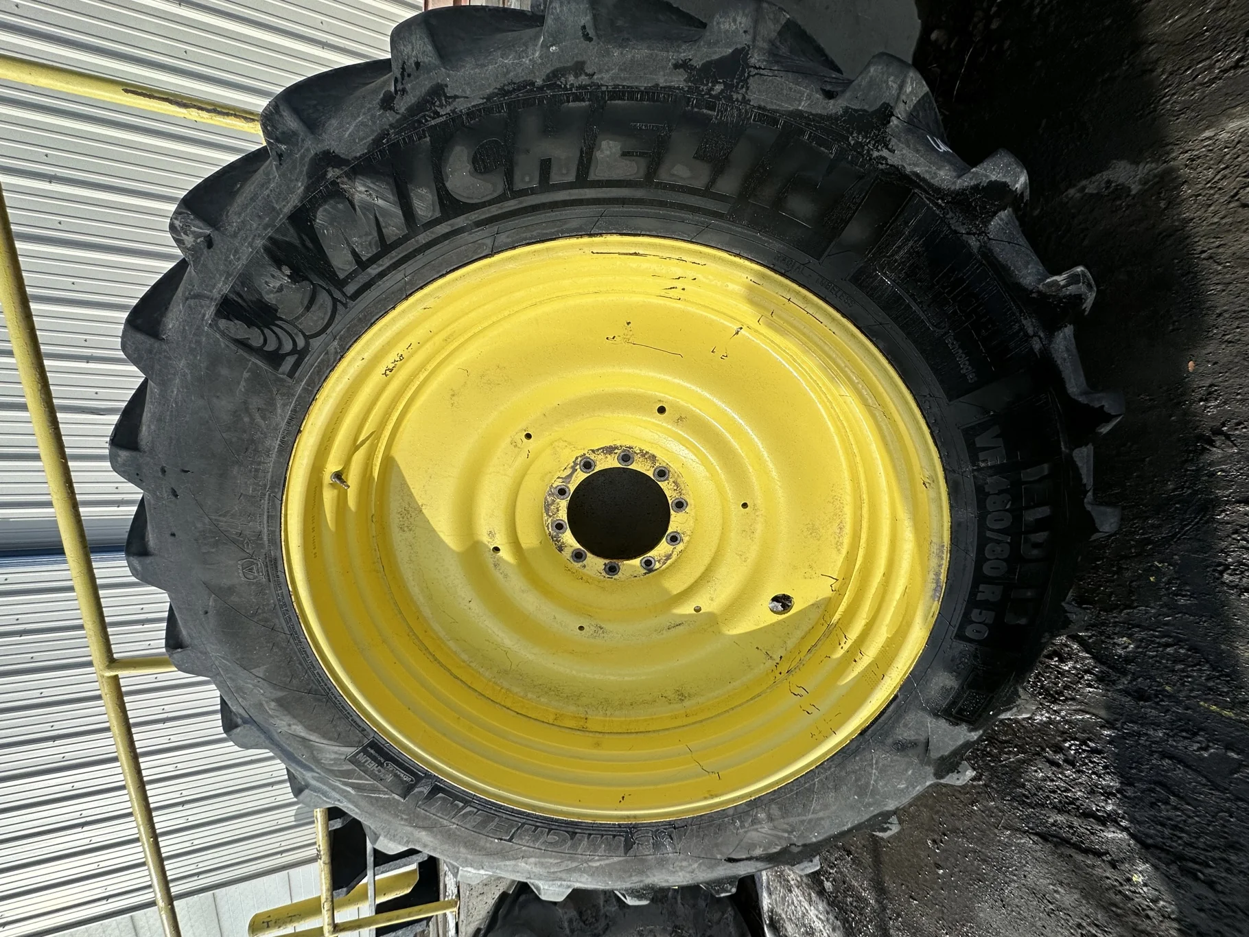 Used 65% VF480/80R50 Michelin YieldBib R-1W 166A8/166B TL on a 15 x 50 JD Yellow 10 Bolt (.906 image 5