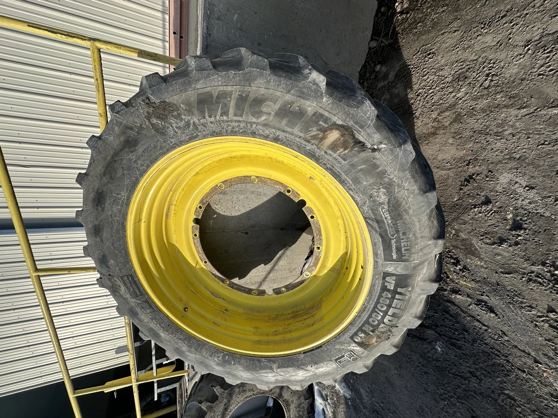 Used 50% VF480/80R50 Michelin YieldBib R-1W (166A8/166B) TL on a 15 x 50 JD Yellow 12 Bolt Stu