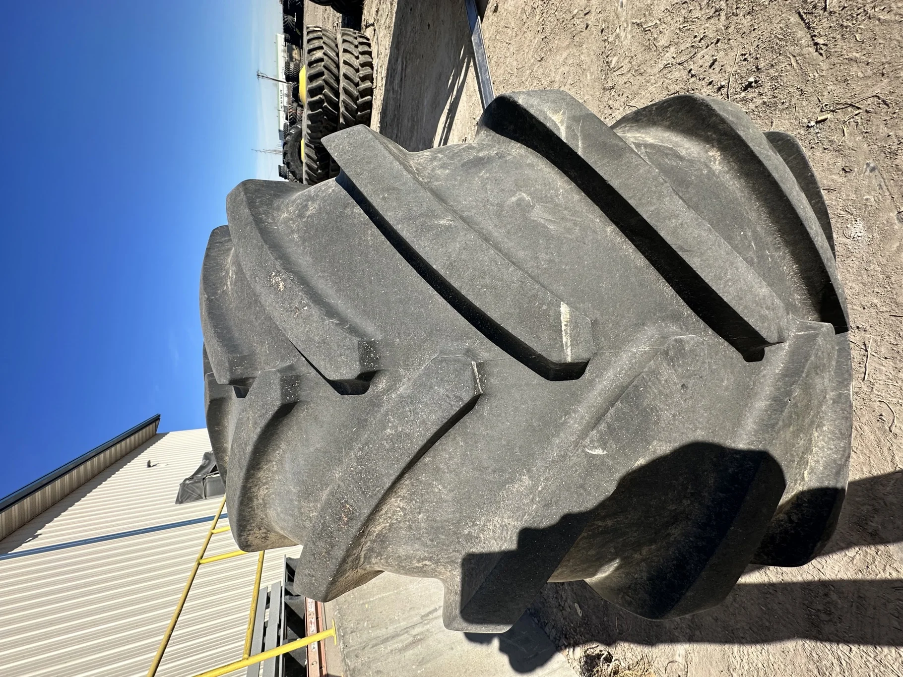 Used 70% 750/65R26 Michelin MegaXBib R-1W 171A8/171B TL on a 25 x 26 JD Yellow 8 Bolt Rear Com image 6