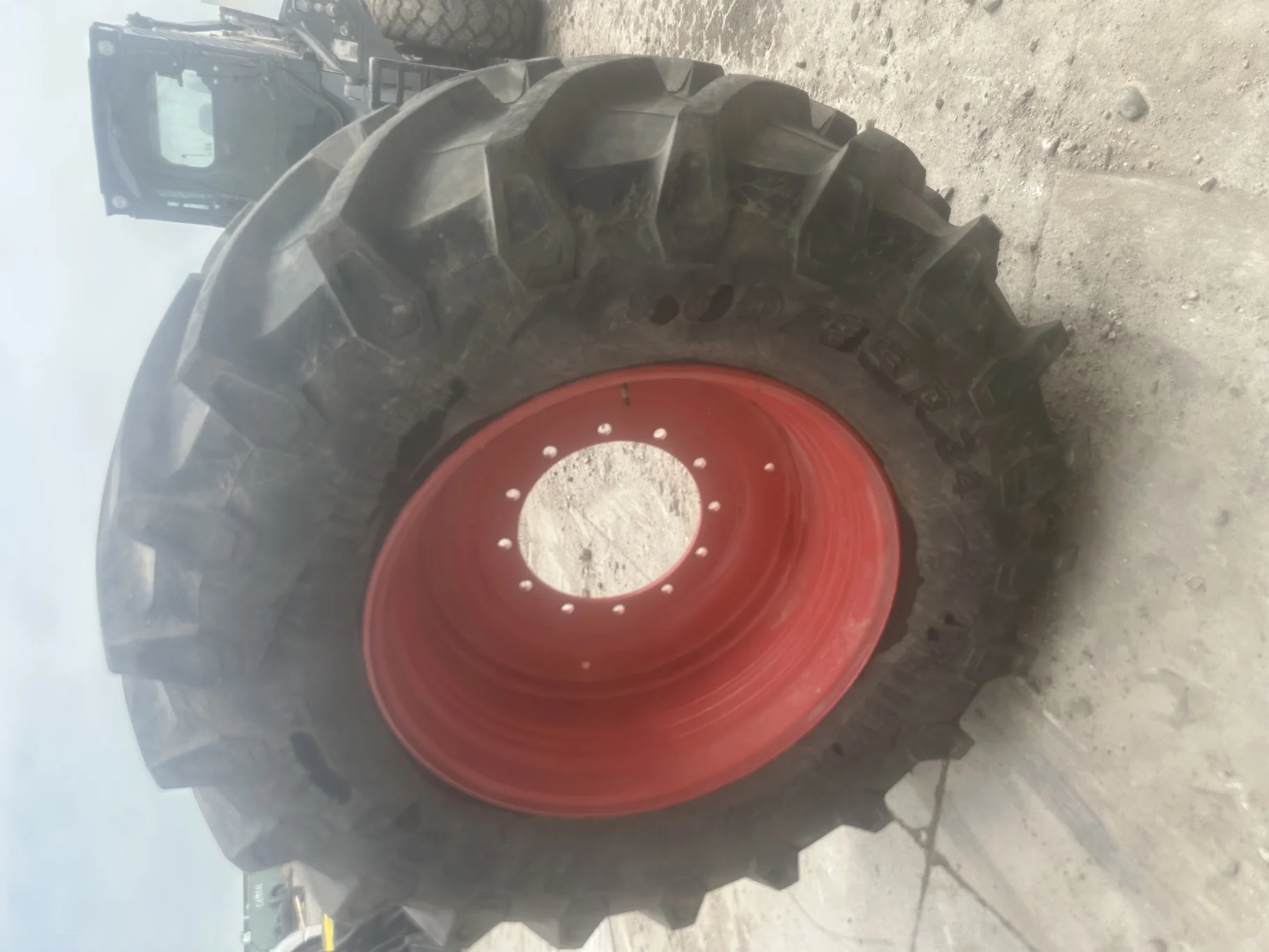 USED 90% 600/65R34 Trelleborg TM800 High Speed R-1W (157D) TL on a 18 X 34 Fendt Red Waffle Wheel