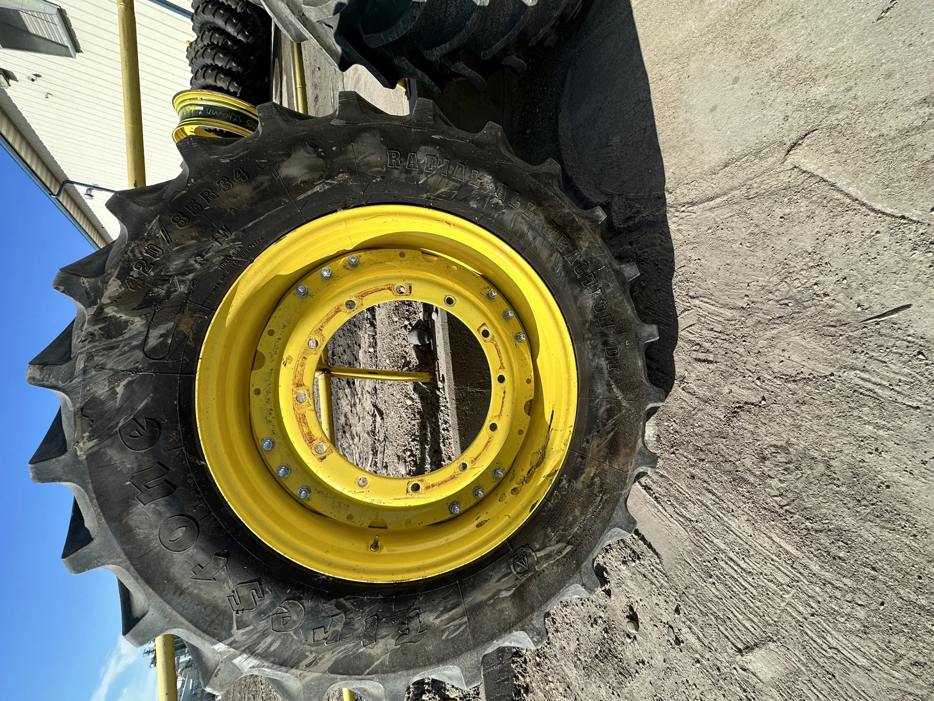 Used 85% 420/85R34 (16.9R34) Firestone Radial All Traction DT R-1W (147A8/147B) TL on a 15 x 34 JD Y image 2