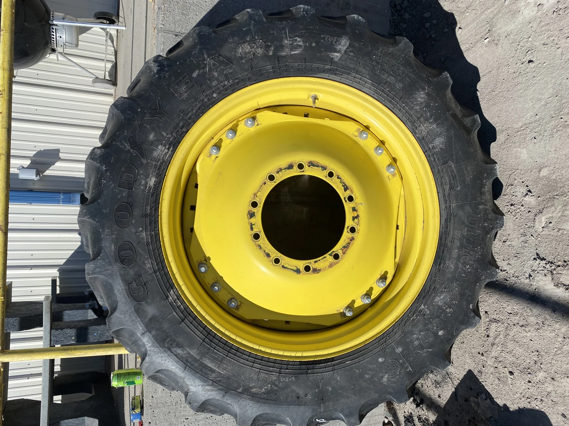 Used 50% 380/85R34 Goodyear Ultra Torque DT 712(137A8) R-1 TL on a 13 x 34 JD Yellow 10 Bolt