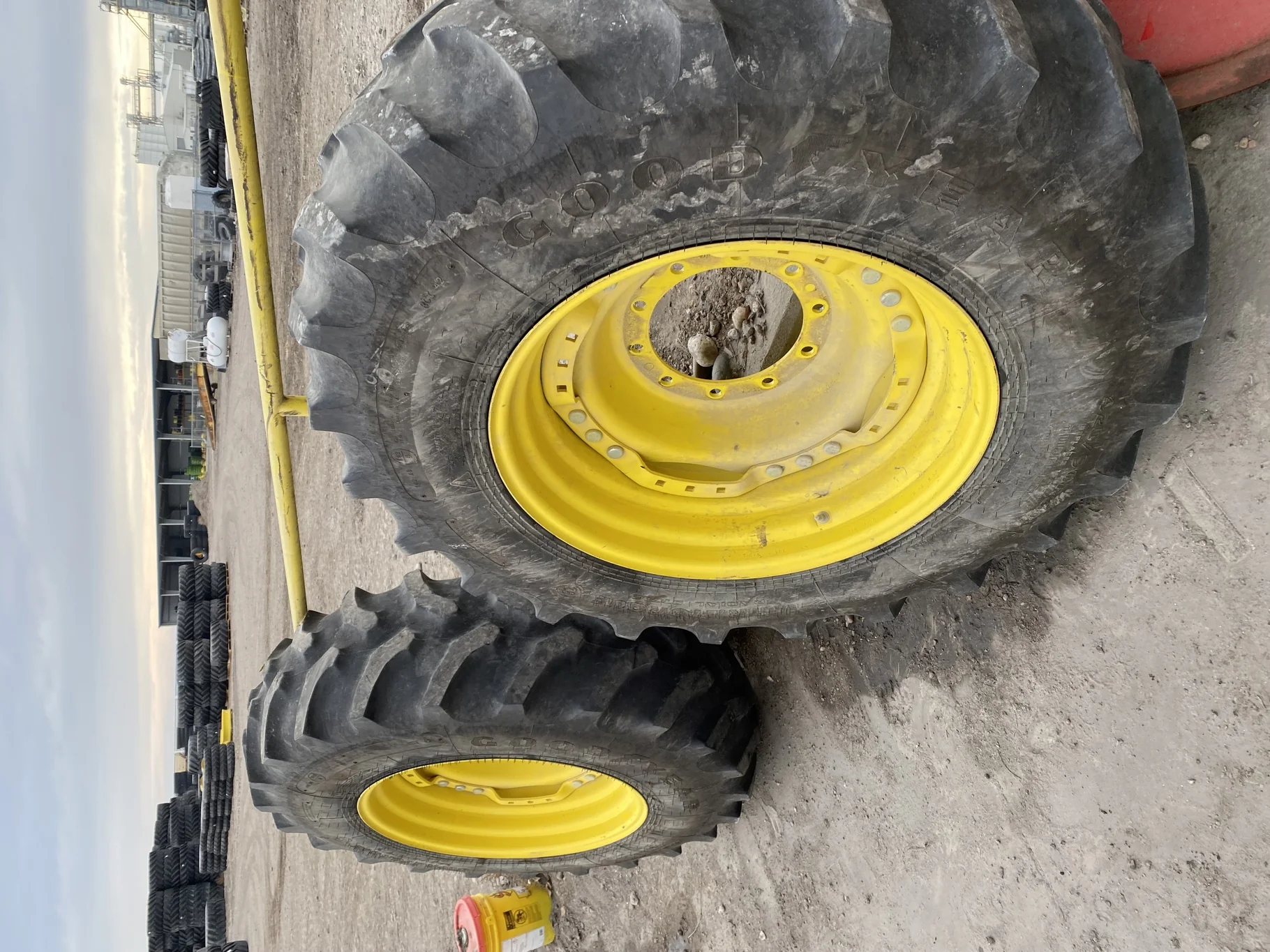 Used 36% 420/90R30 Goodyear Ultra Torque Radial DT 712 (142A8/B) R-1 TL on a 15 x 30 JD Yellow image 2